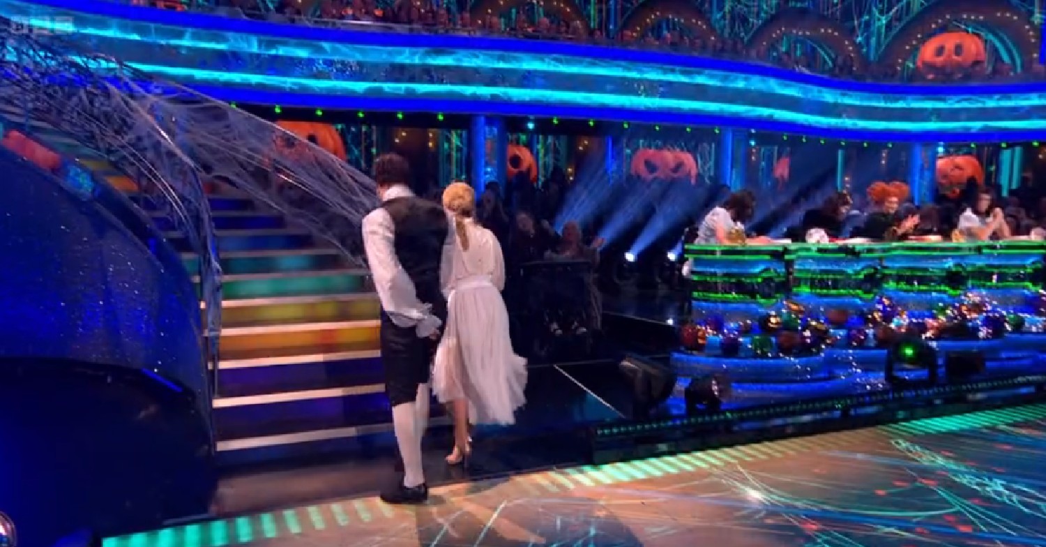 Vito Coppola and Sarah Hadland walking up stairs on Strictly