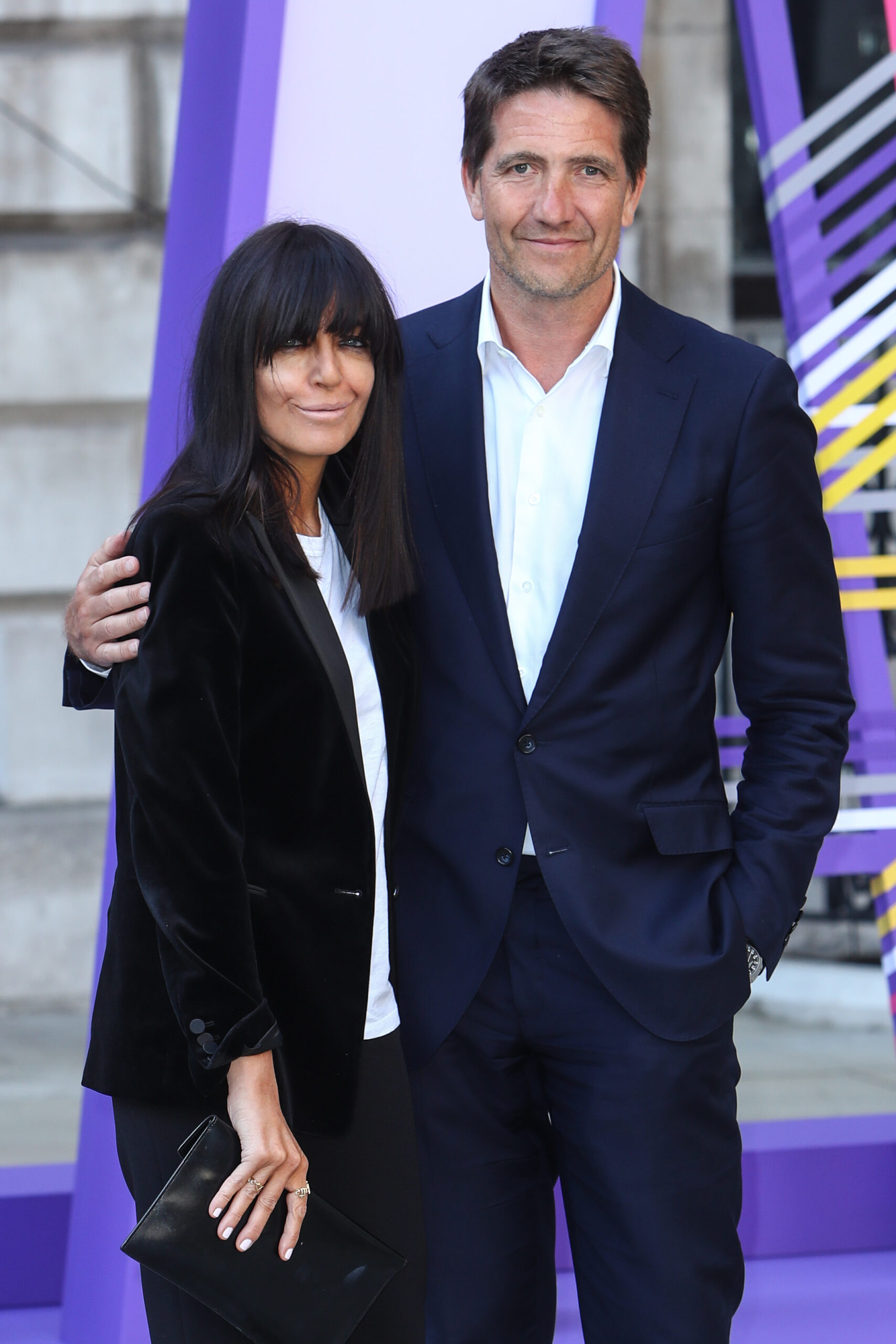 Claudia and her husband posing