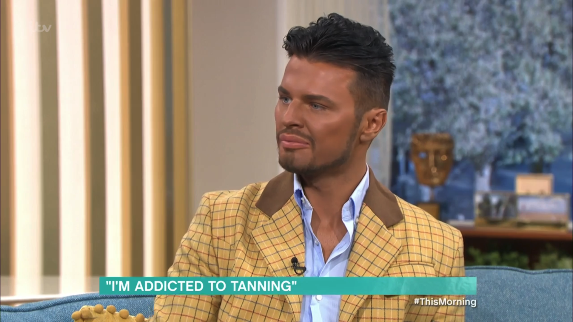 Jimmy Featherstone on This Morning in a yellow jacket