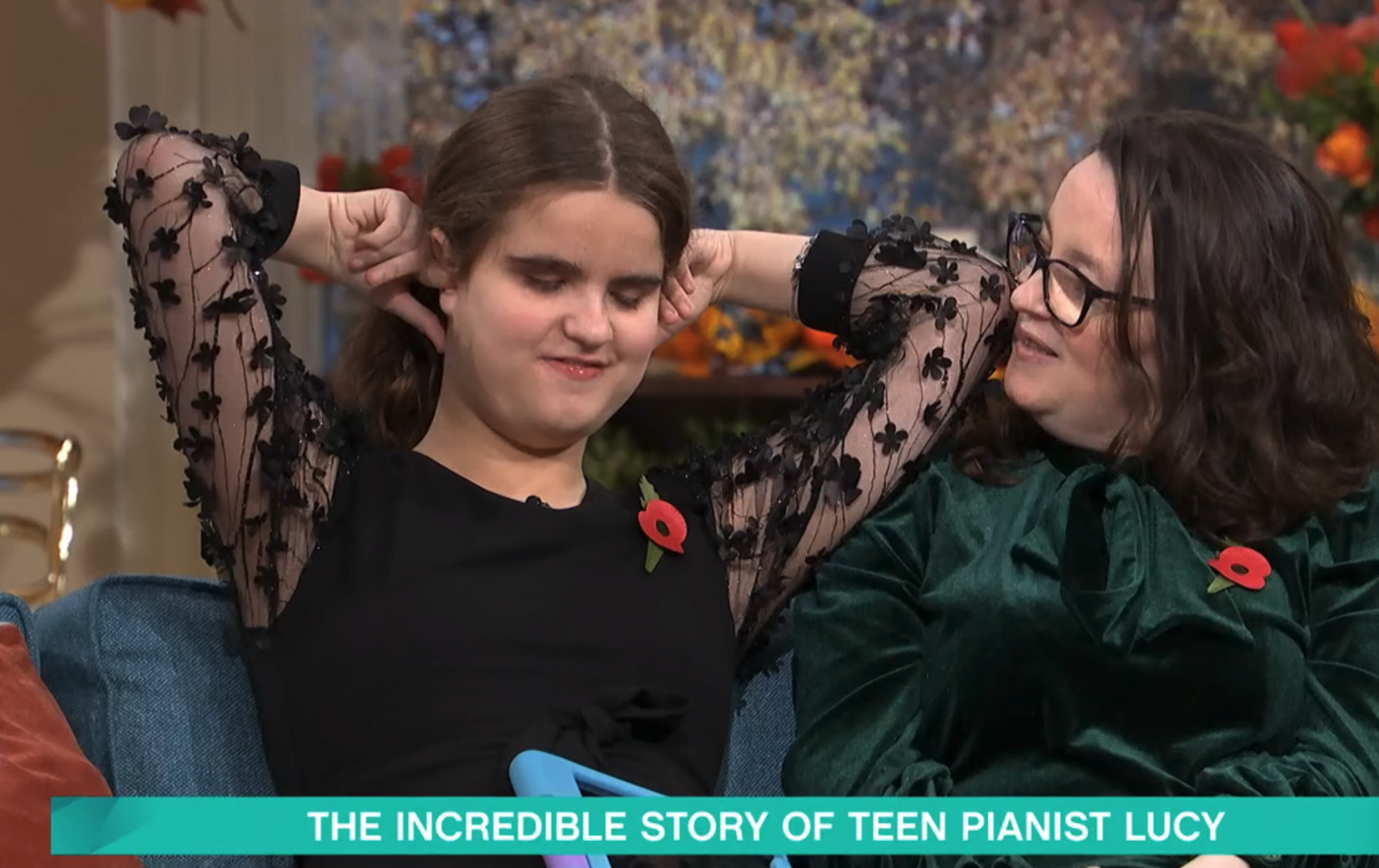 Lucy from the Piano holding her ears on This Morning today