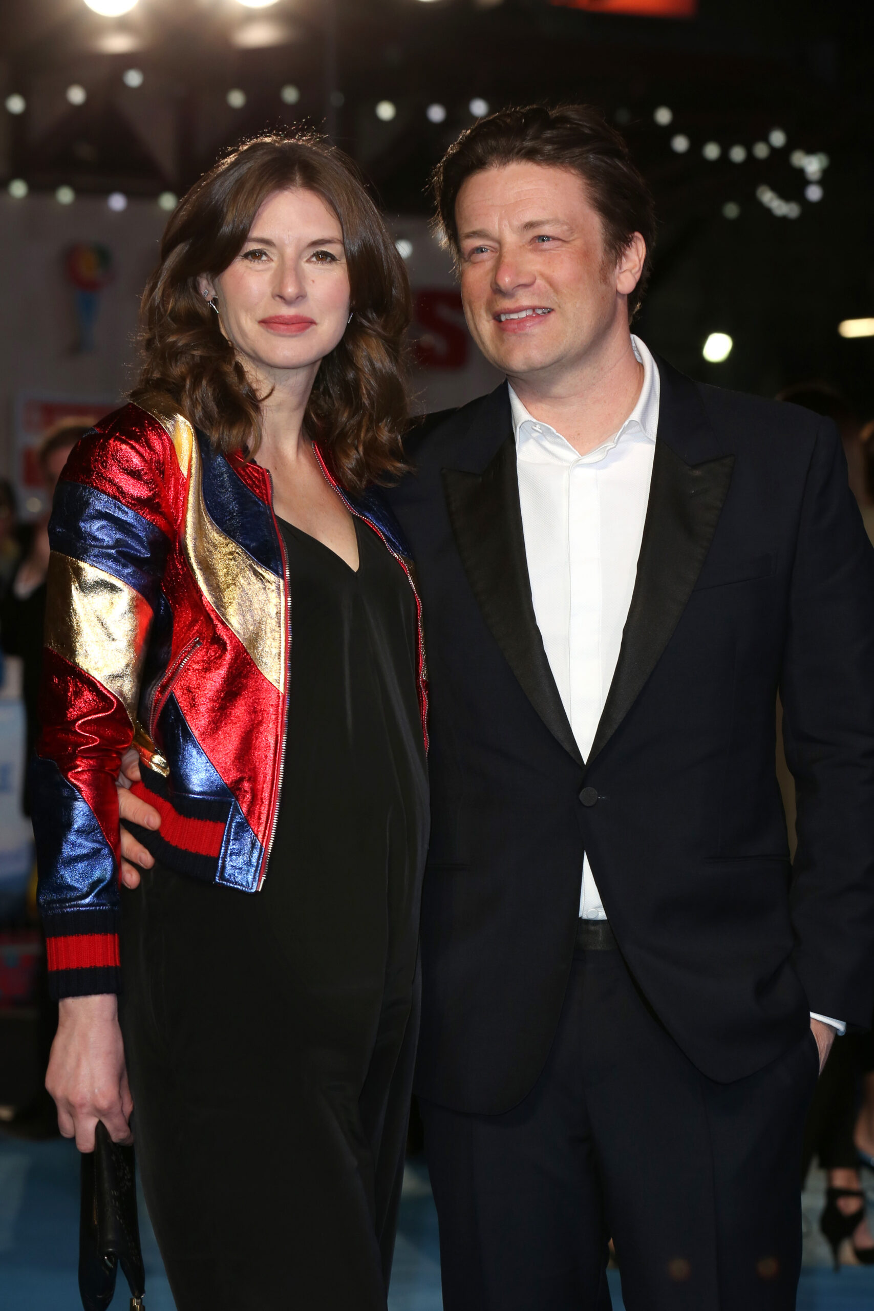 Jamie Oliver and wife Jools posing