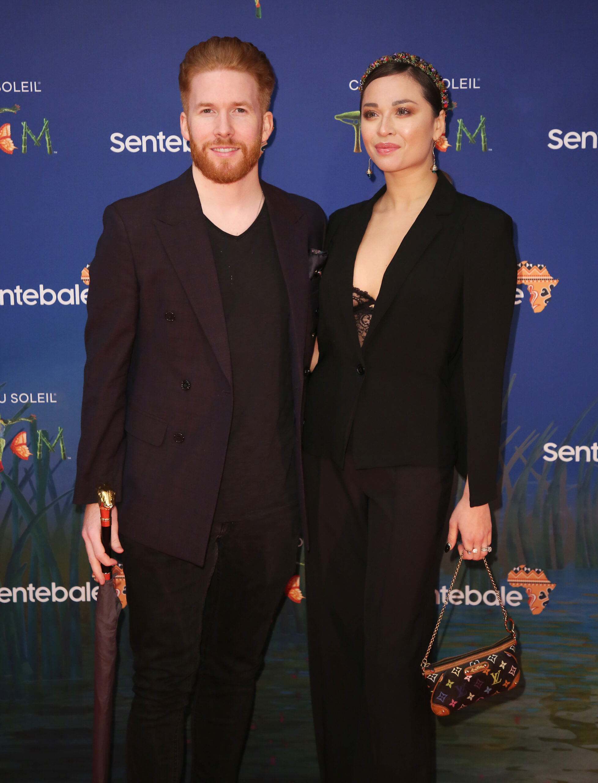 Katya and Neil Jones smiling and posing