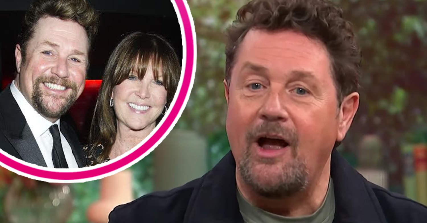 Michael Ball and his partner smiling with Michael looking shocked