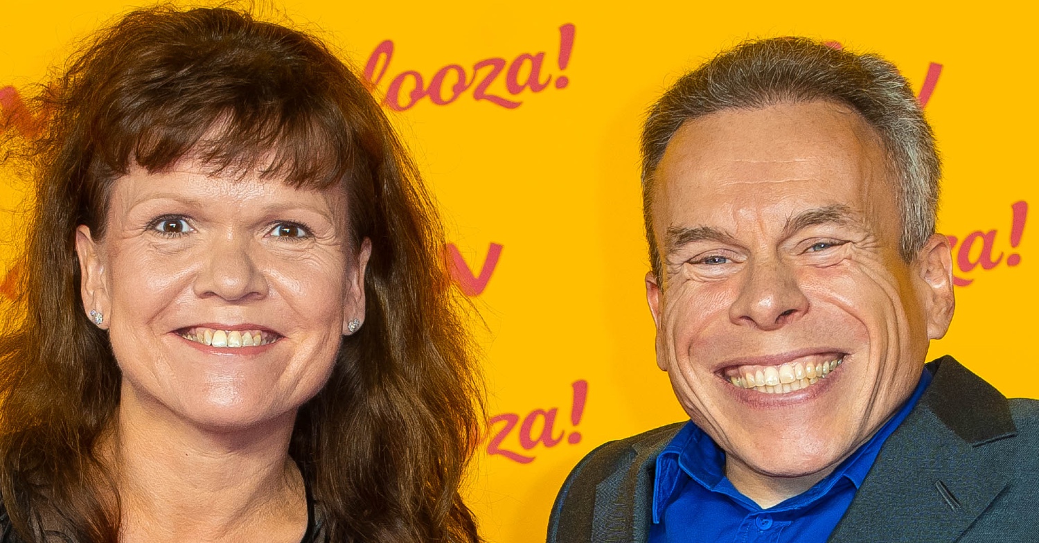 Warwick Davis smiling with his wife Samantha