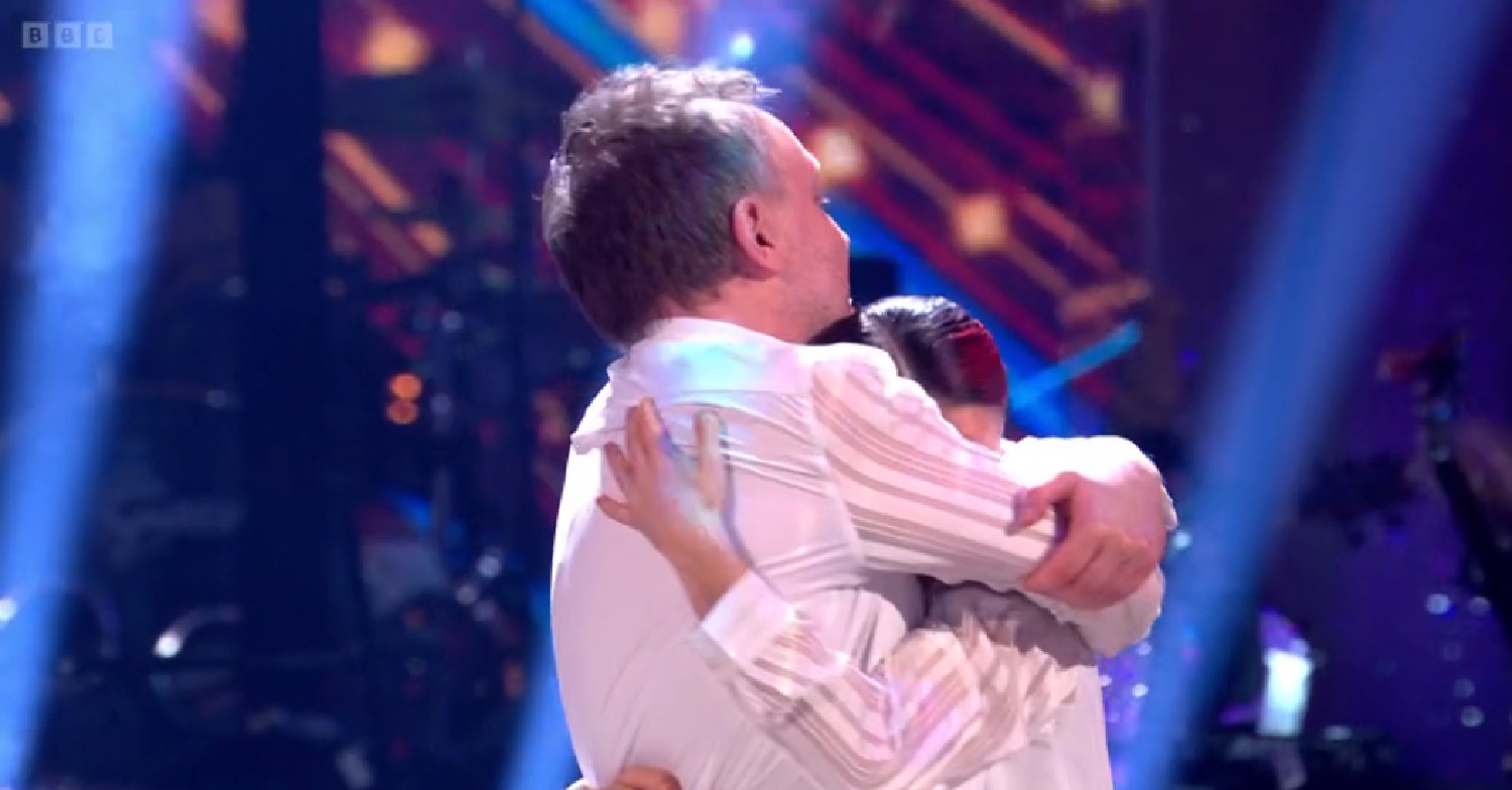 Chris McCausland and Dianne Buswell hugging on Strictly