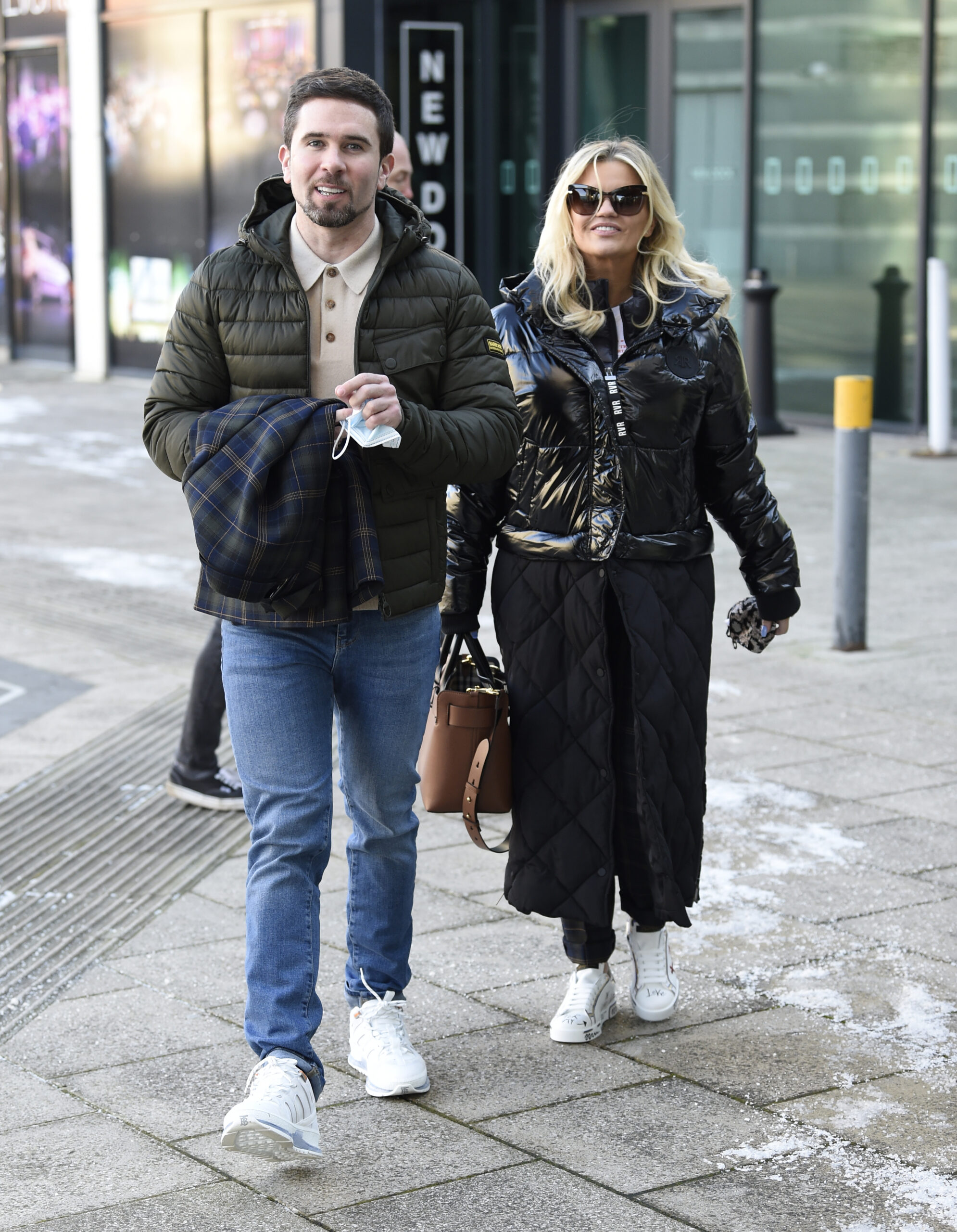 Kerry Katona and Ryan Mahoney walking in the street