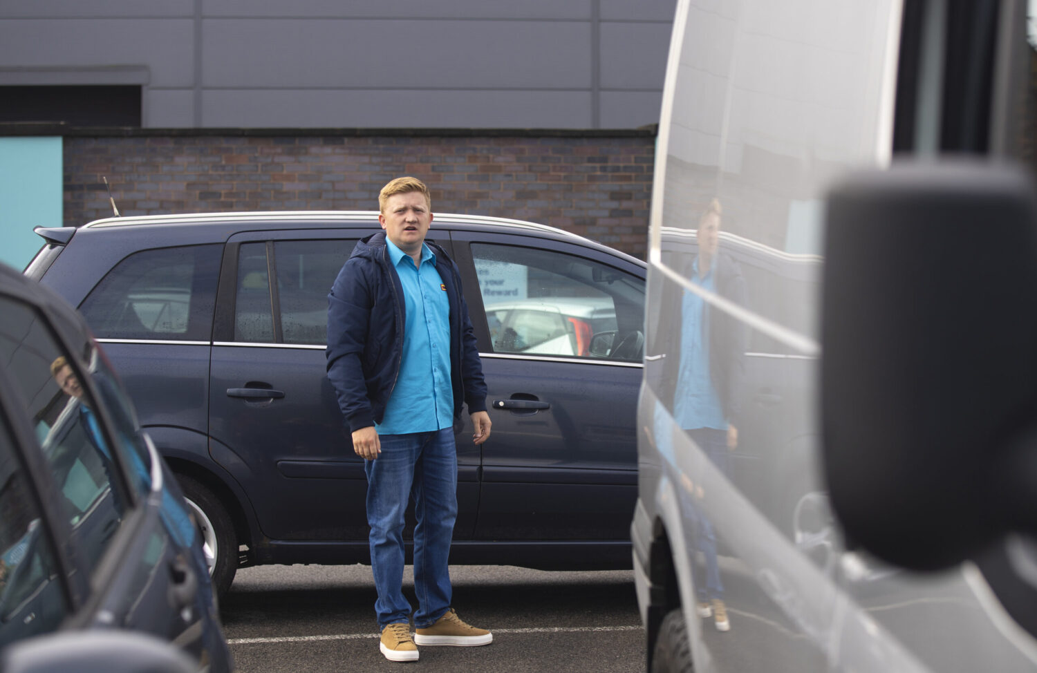 Coronation Street: Chesney stand in a carpark whilst looking miserable