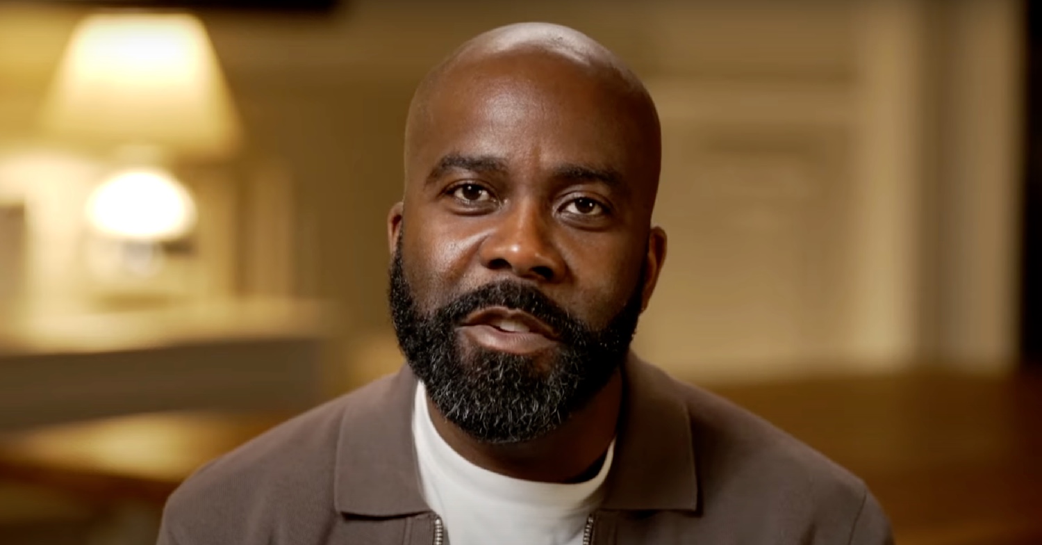 Melvin Odoom speaking to camera