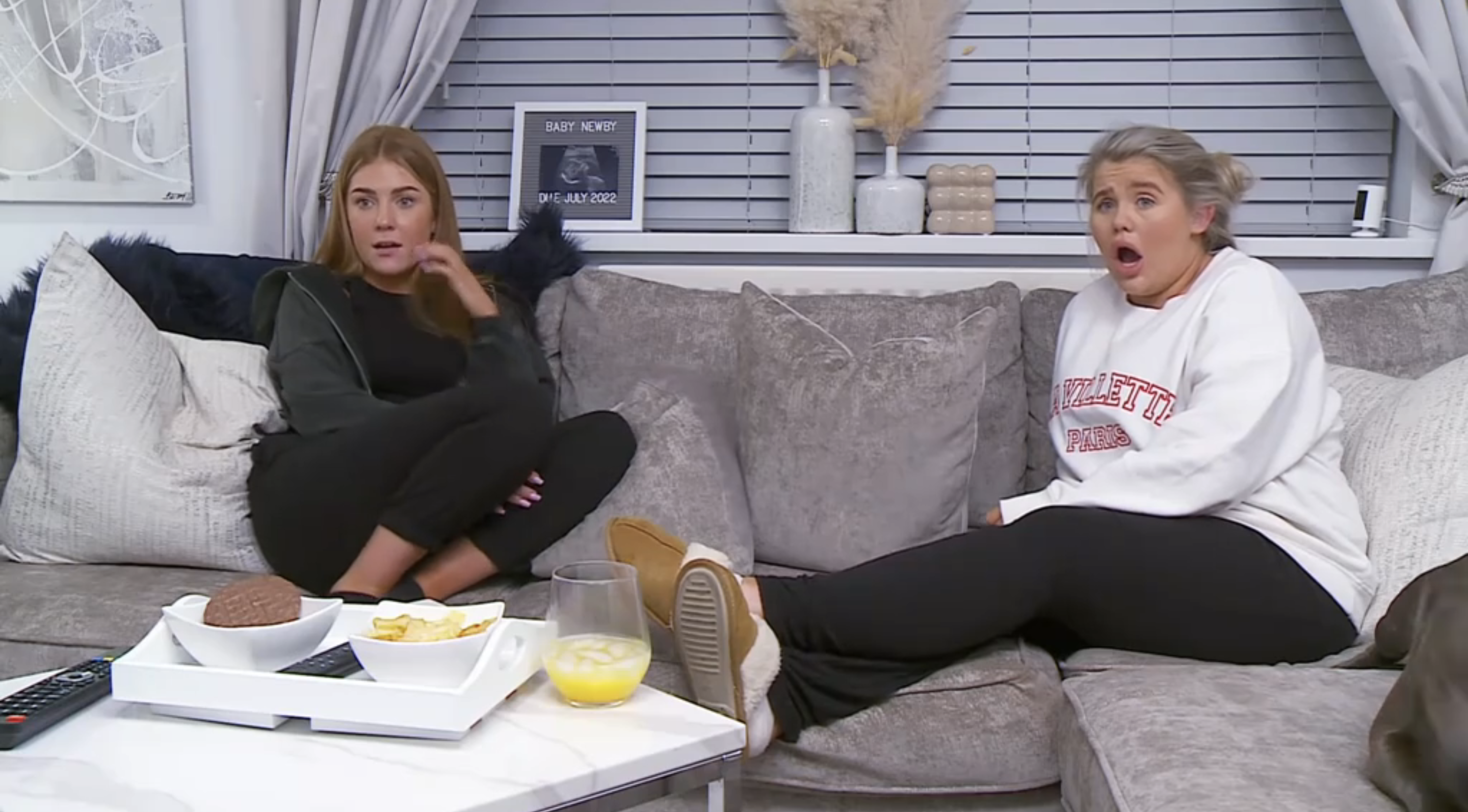 Georgia Bell and Abbie Lynn sit on opposite ends of the Gogglebox sofa