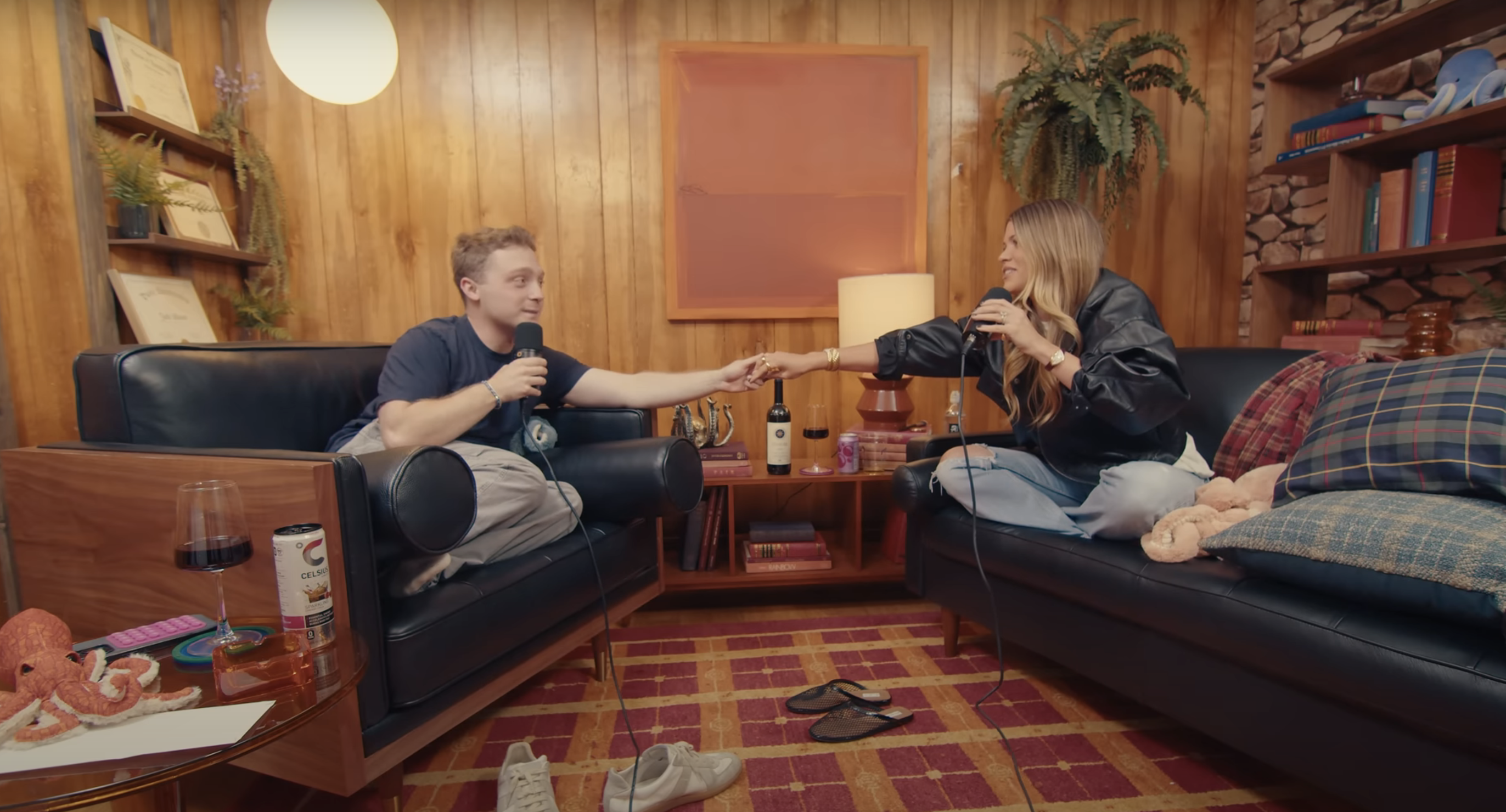 Sofia Richie and podcast host Sofia Richie holding hands during an episode of Therapuss