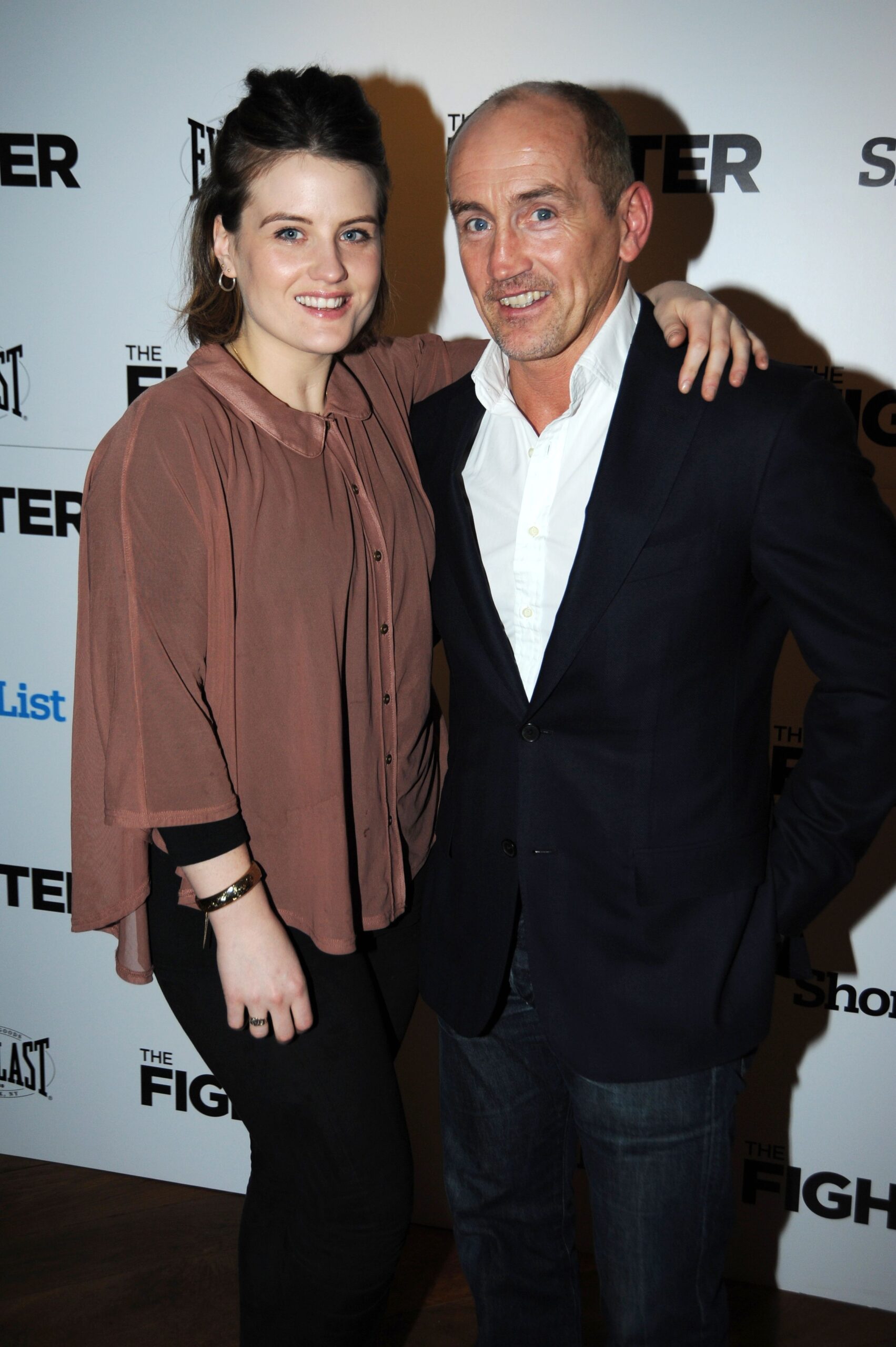 Barry McGuigan smiling with his daughter