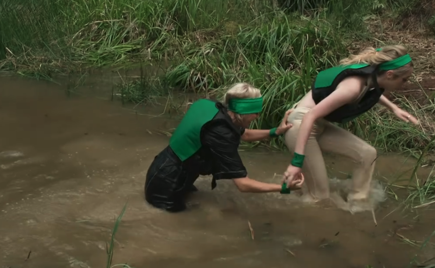 Jane Moore helping GK Barry out of the swamp