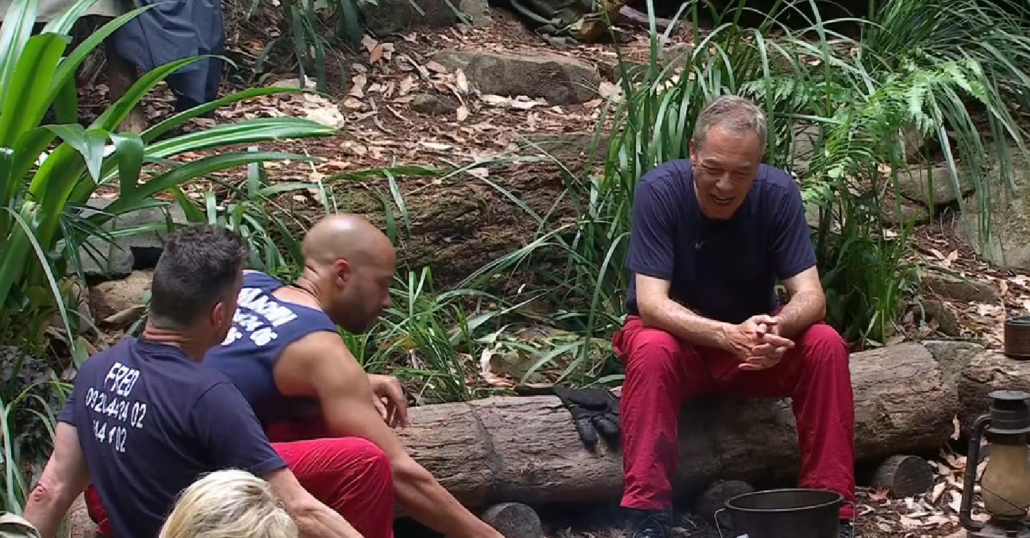 I'm A Celebrity 2023 campmates sat around fire
