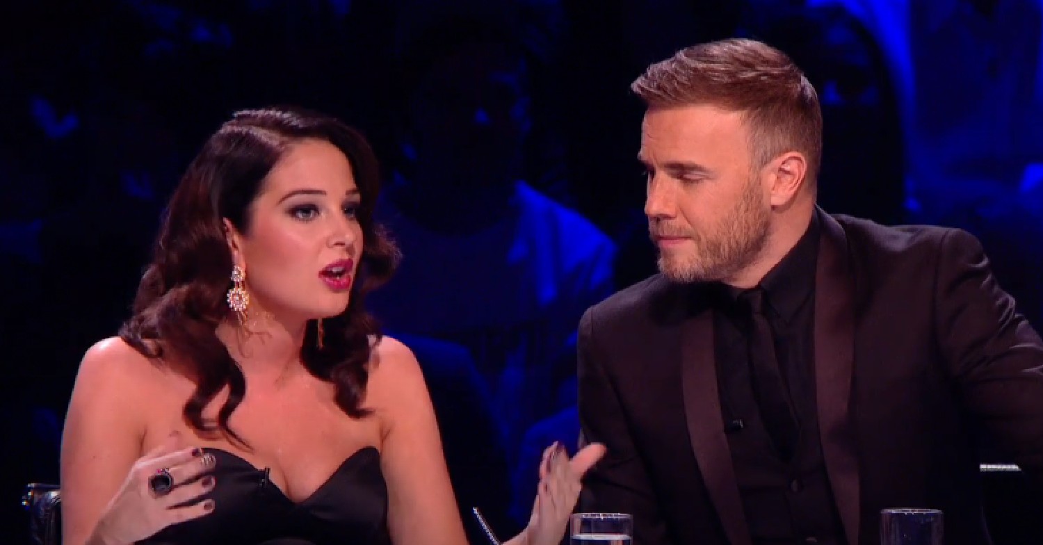 Tulisa talking to Gary Barlow on The X Factor