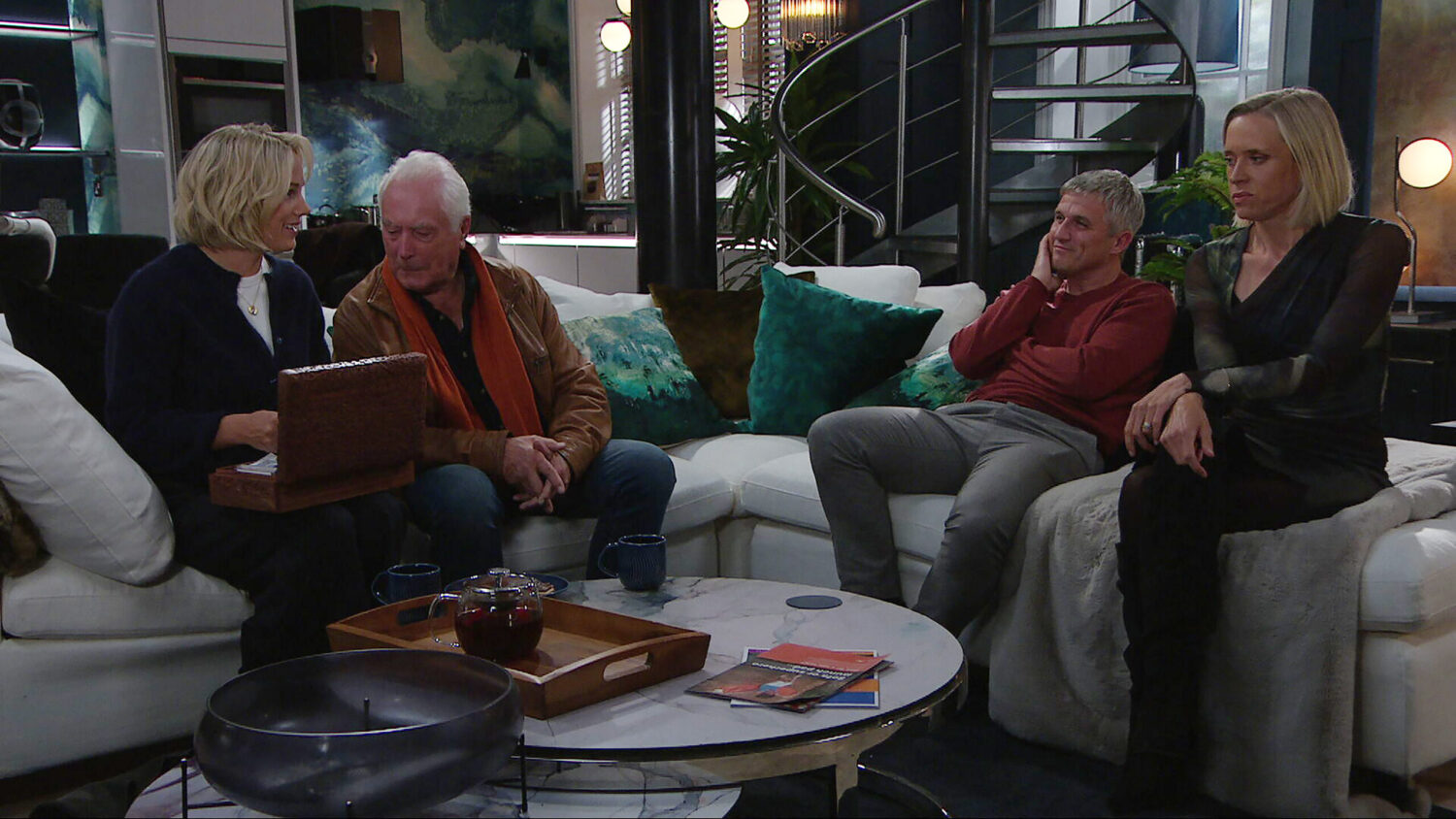 Steph, Anthony, Caleb, Ruby talking on the sofa