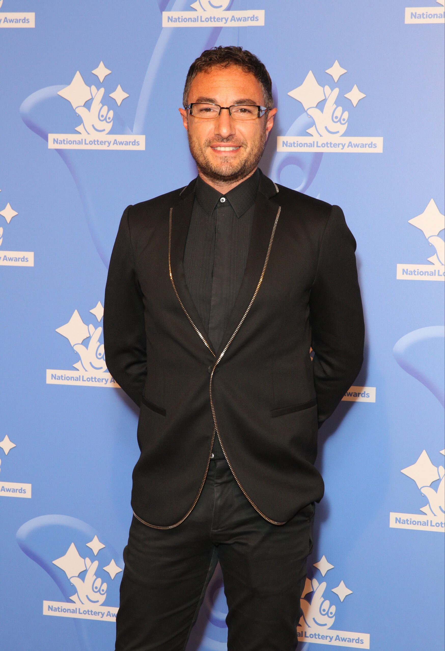 Former Strictly pro Vincent Simone smiling at event