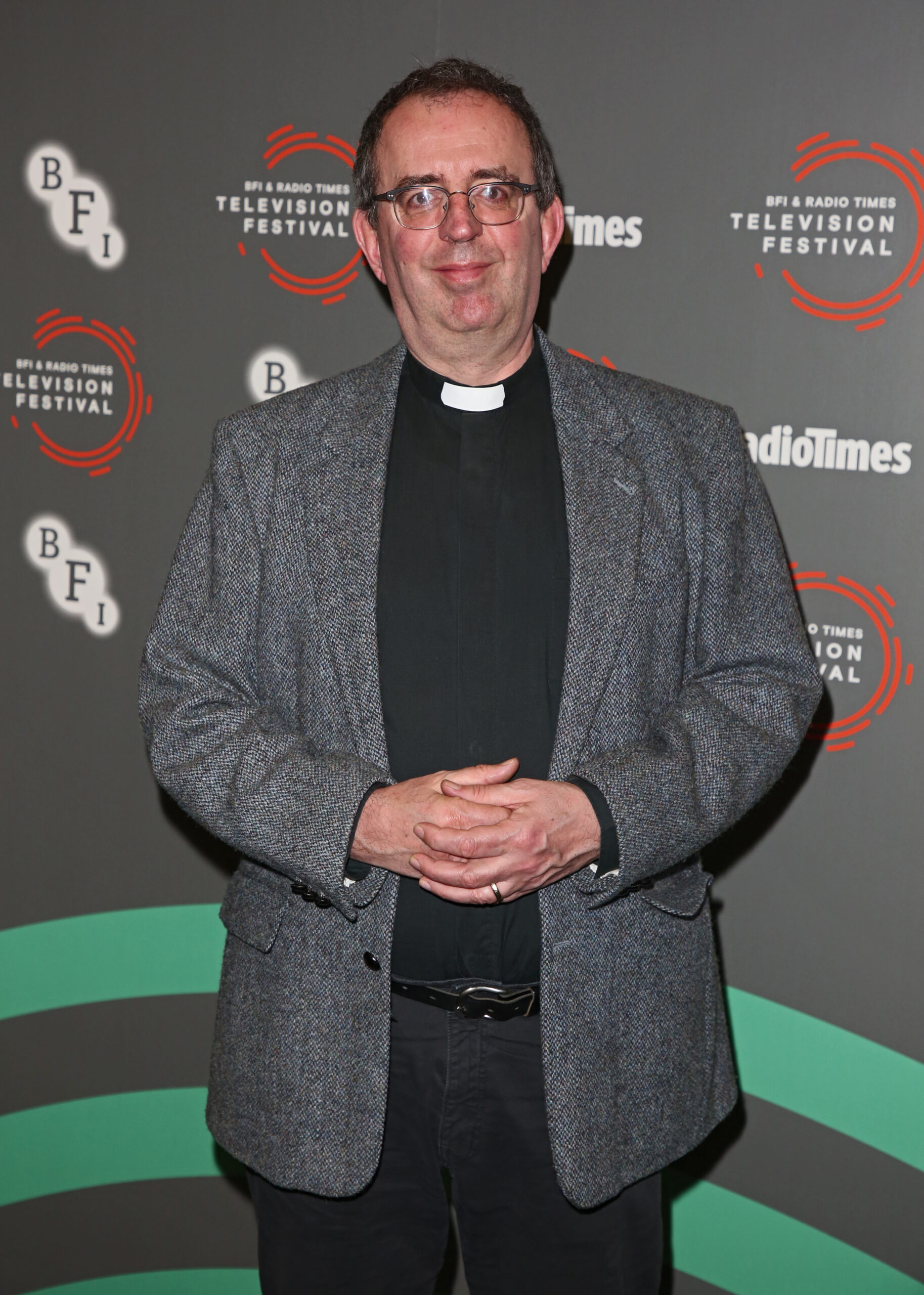 Reverend Richard Coles smiling at event
