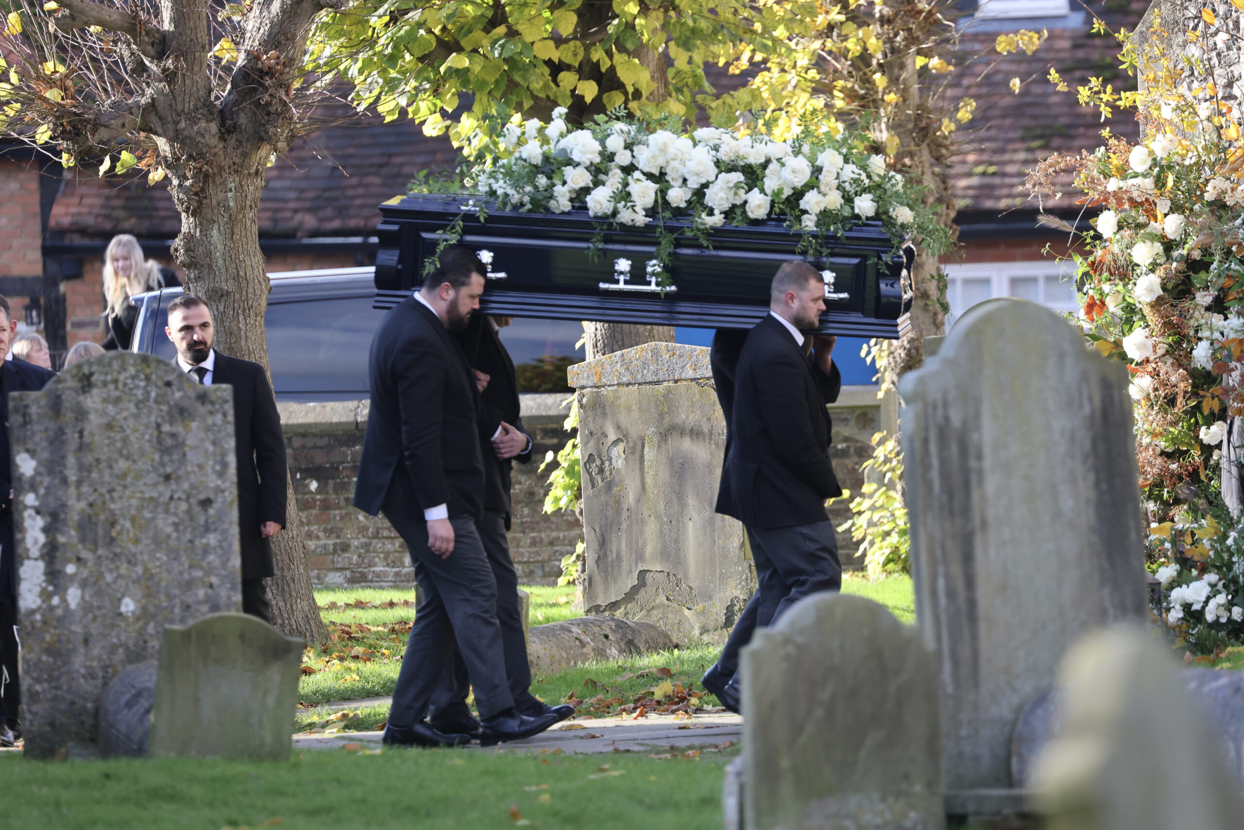 Liam Payne's coffin in a graveyard