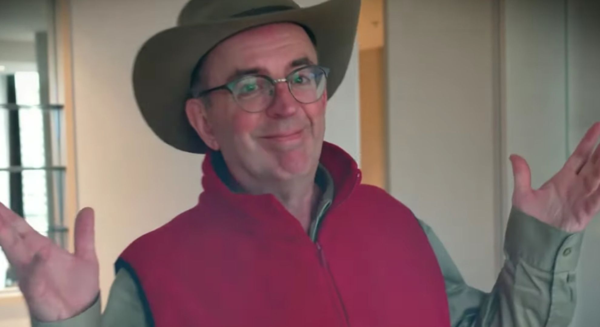 Richard Coles holding his hands up on I'm A Celeb