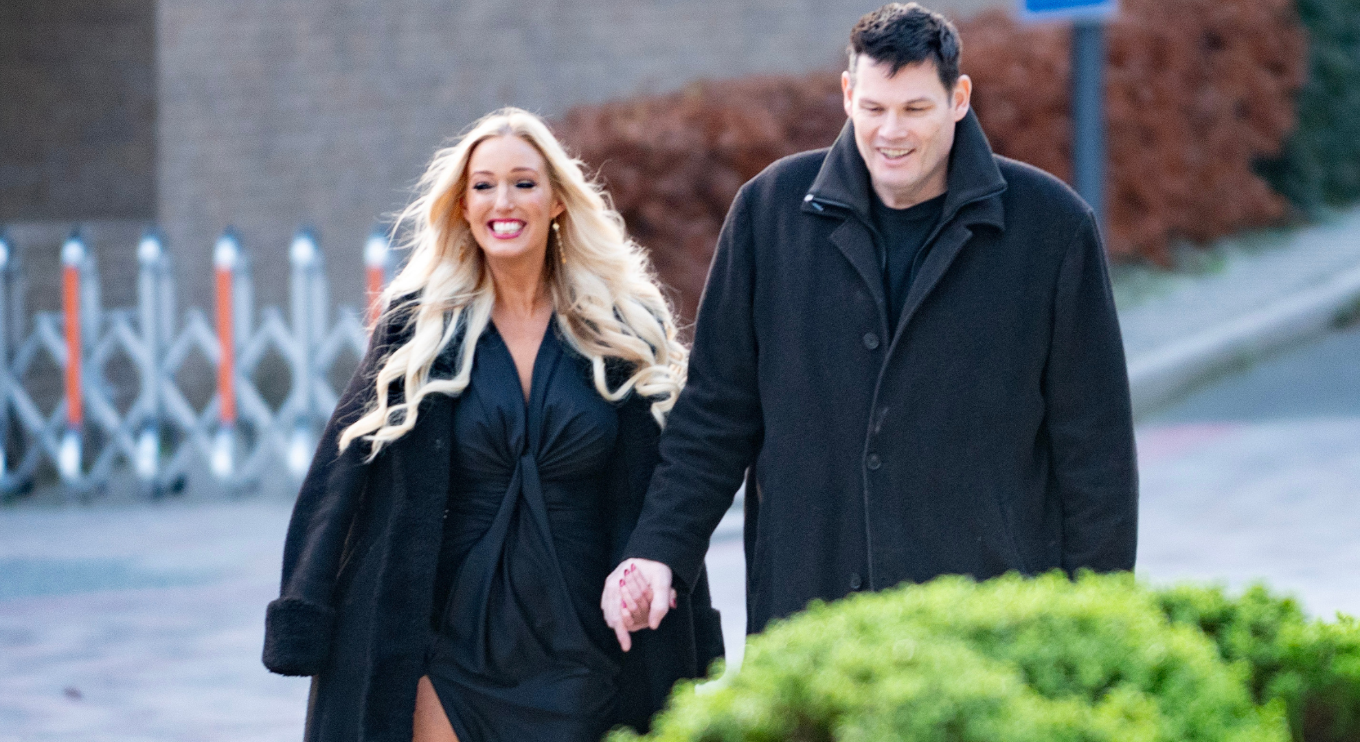 Mark Labbett and Hayley Palmer pictured walking hand in hand