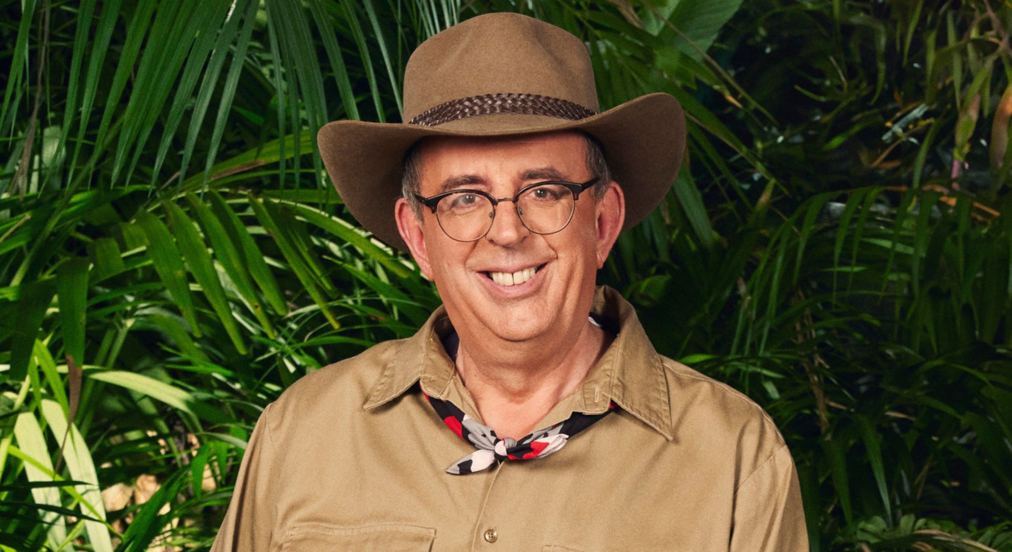 Richard Coles smiling in official I'm A Celebrity pic