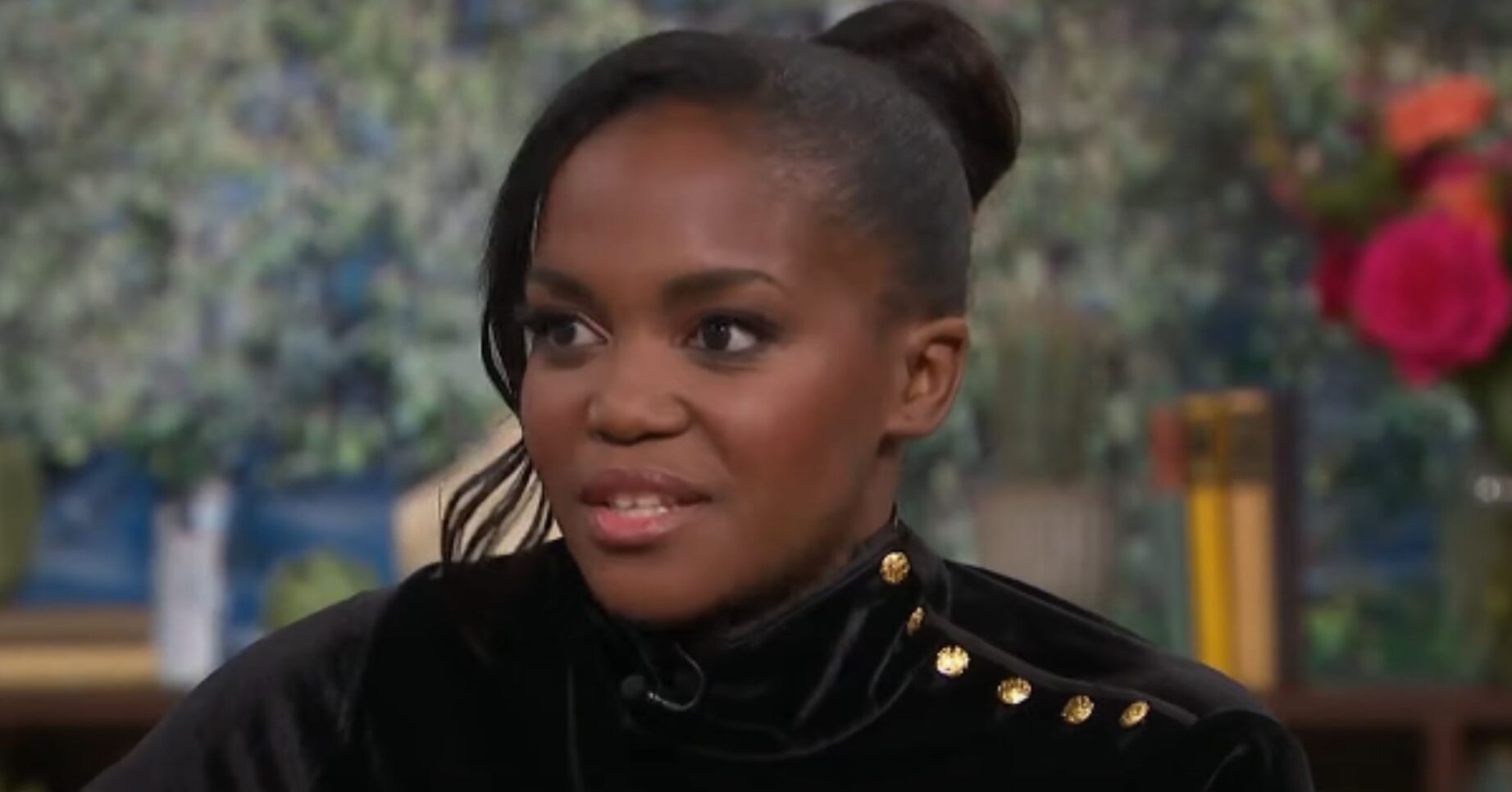 Oti Mabuse talking in black dress on This Morning