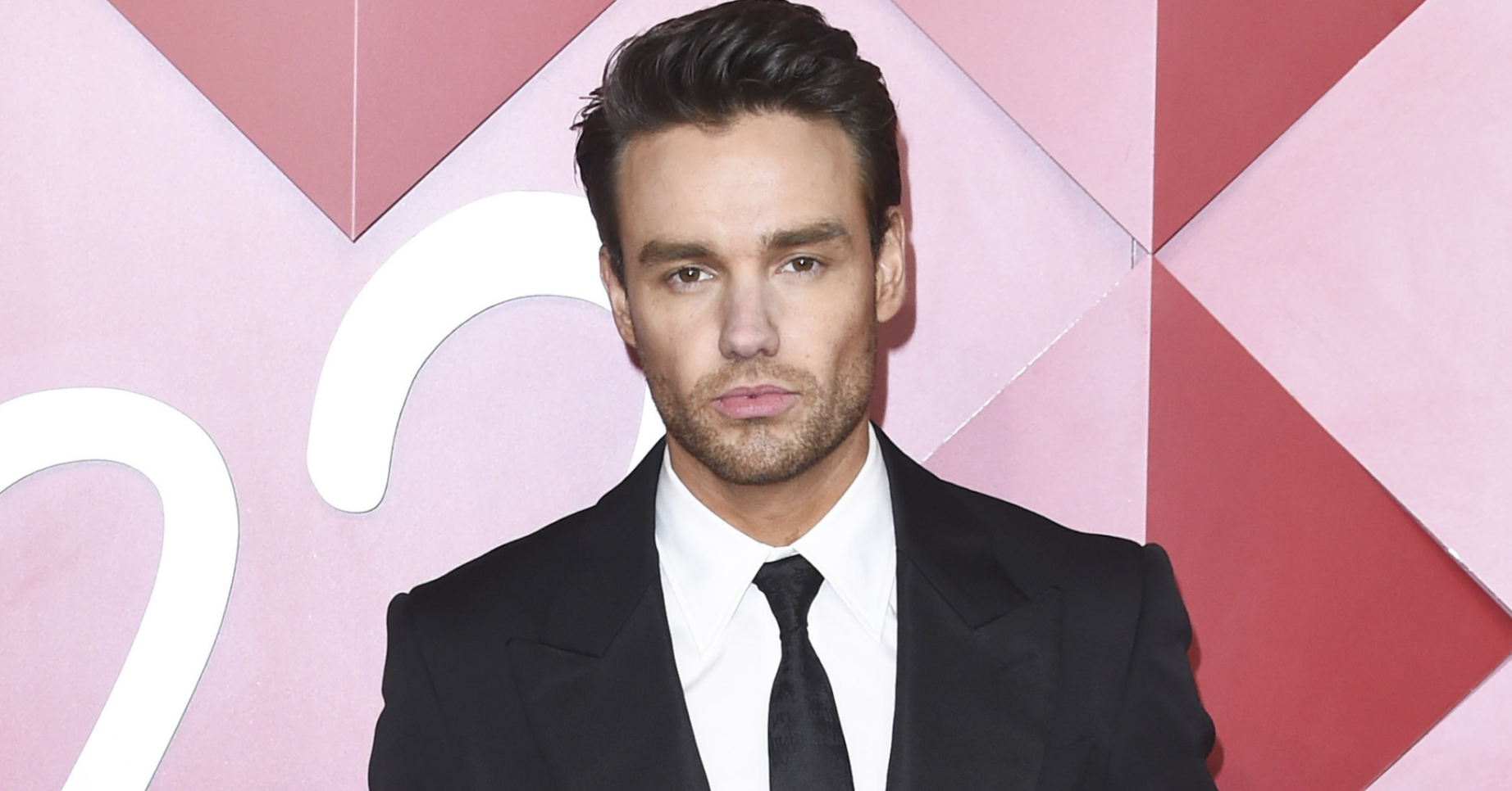 Liam Payne posing at event