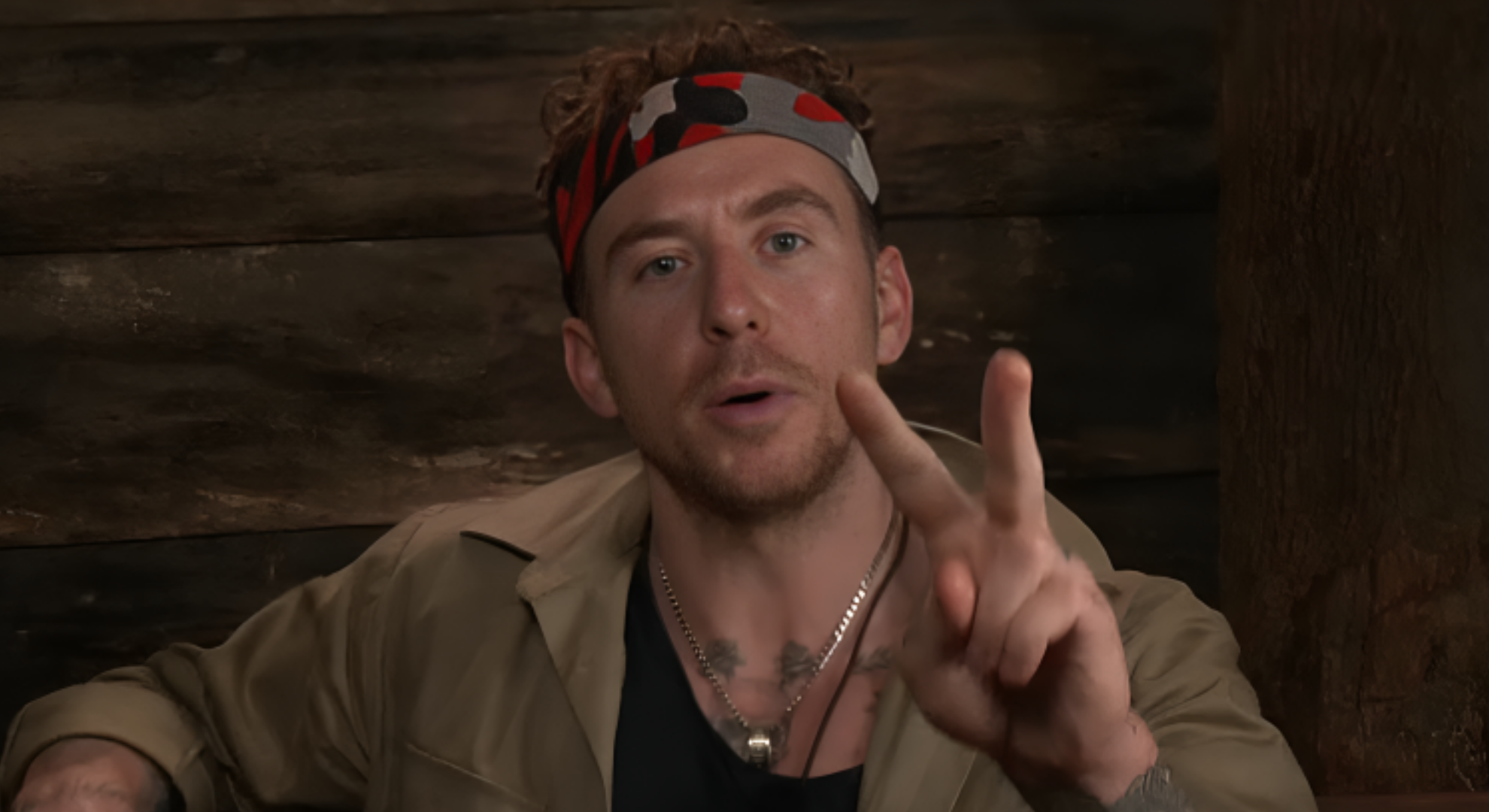 Danny Jones pointing two fingers in the Bush Telegraph on I'm A Celebrity