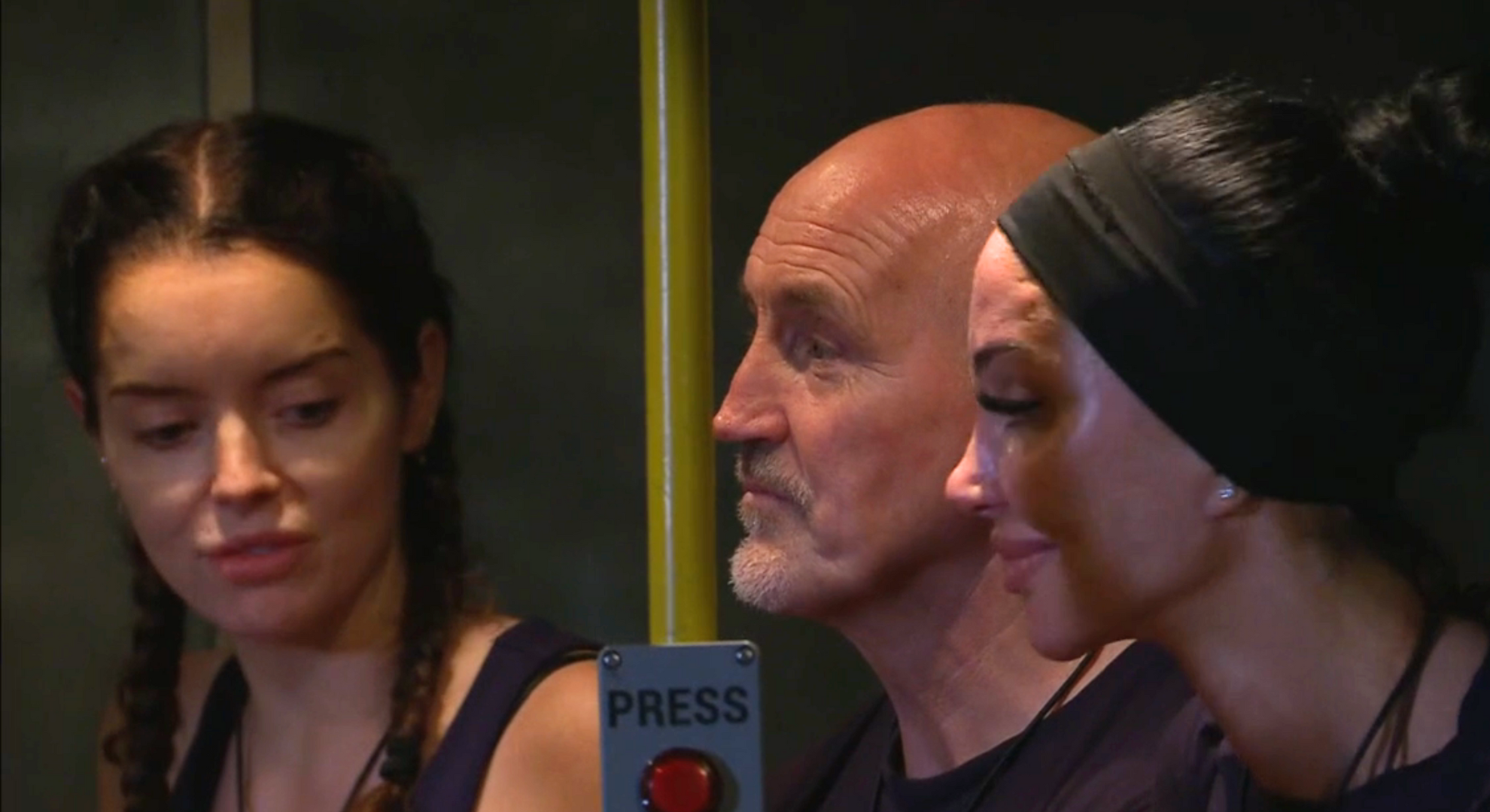 Maura Higgins, Barry McGuigan and Tulisa Contostavlos sitting next to each other during the bus trial on I'm A Celebrity