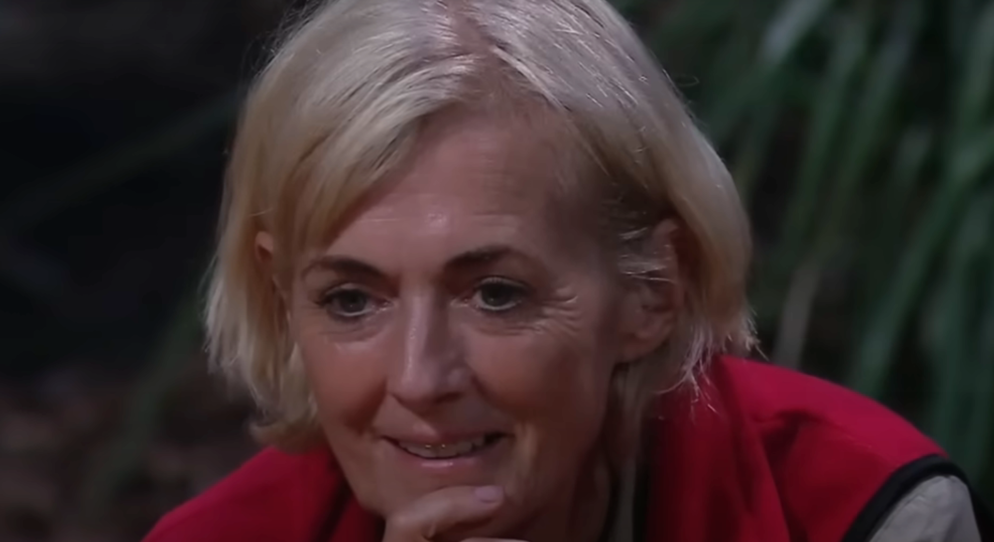 Jane Moore smiling in I'm A Celebrity camp
