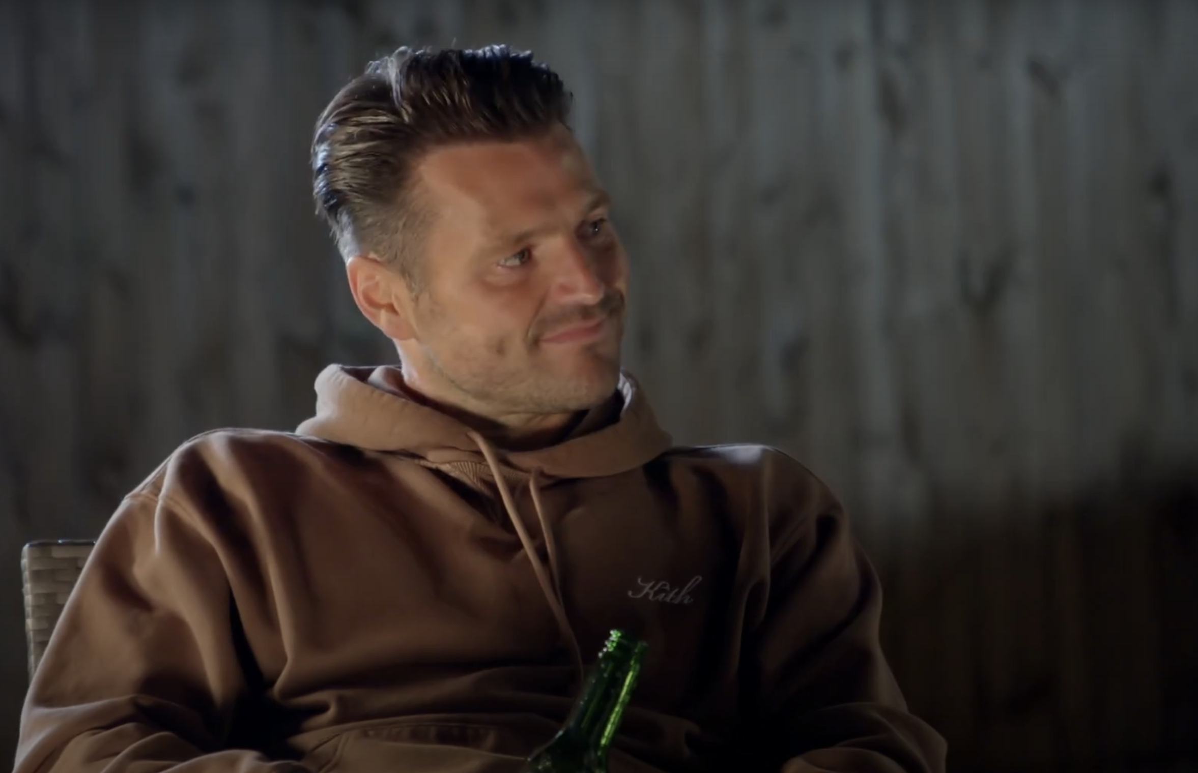 Mark Wright in a brown hoodie in a BBC studio