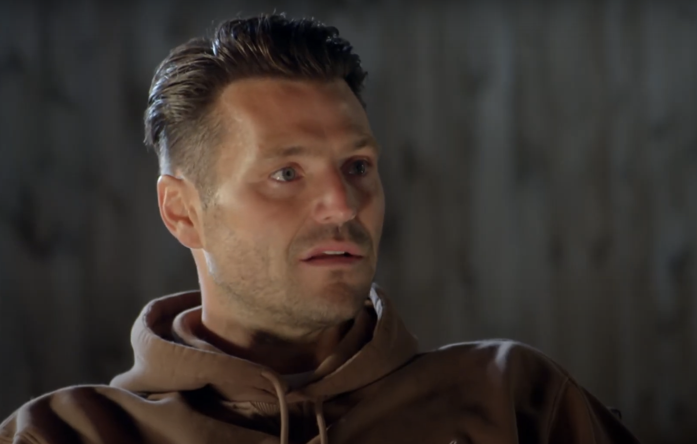 Mark Wright in a brown hoodie in a BBC studio