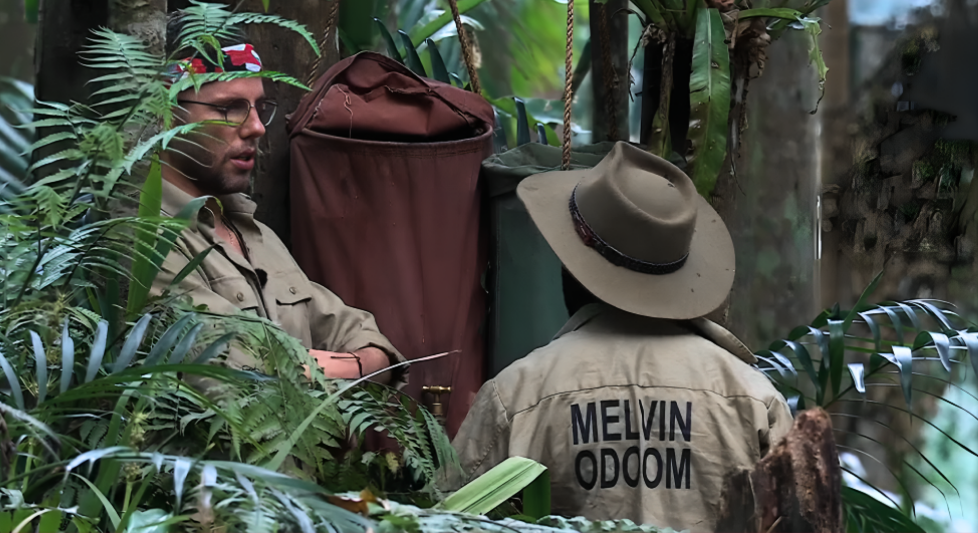 Melvin Odoom tries to explain to Dean McCullough why their chores need doing so frequently in I'm A Celebrity.