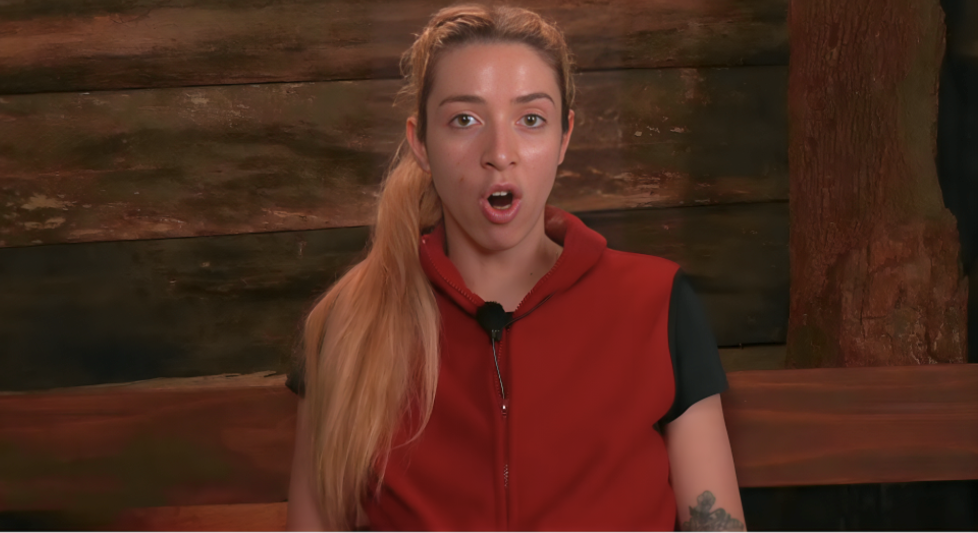 GK Barry wears a black tee with a red fleece in the I'm A Celebrity confessional