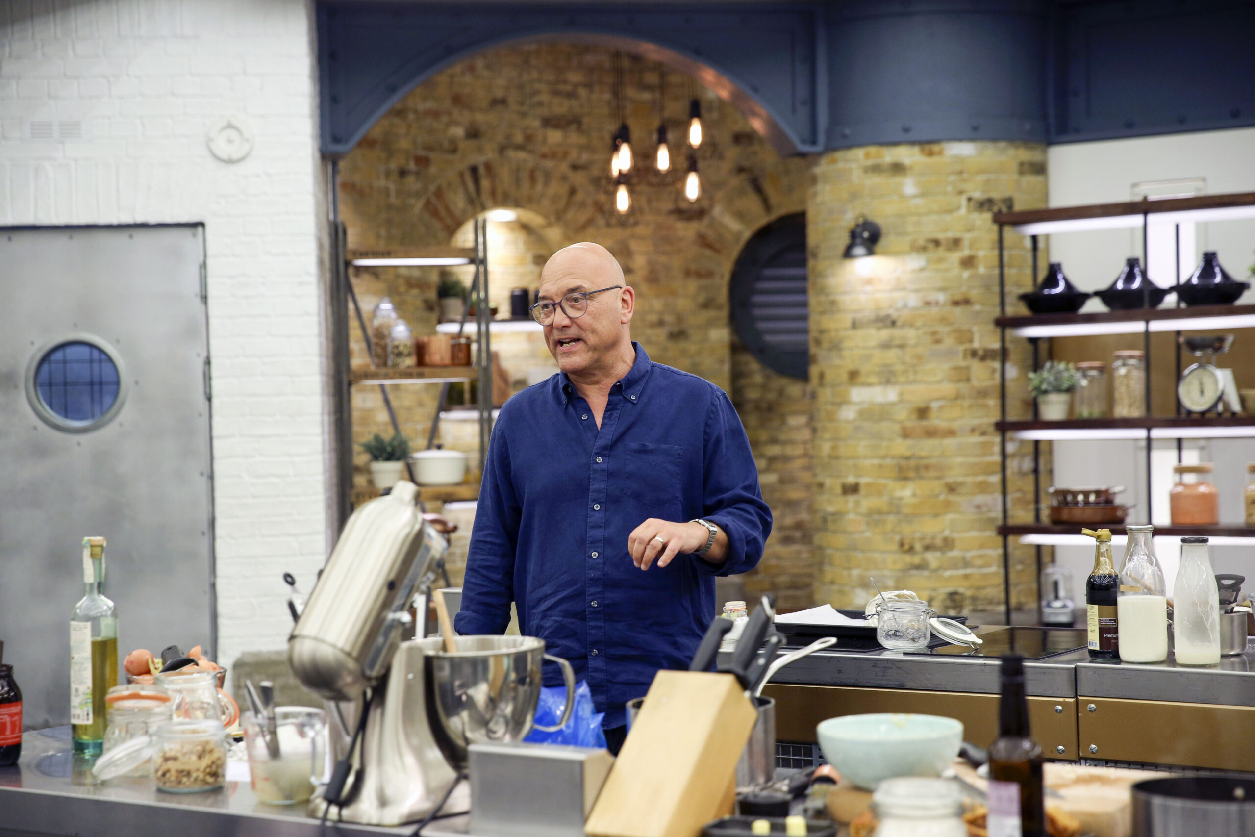 Gregg Wallace on MasterChef in blue shirt