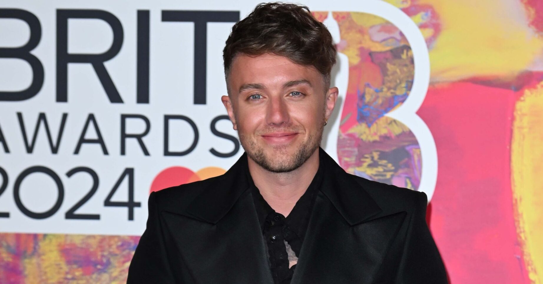 Roman Kemp on the red carpet at the BRIT Awards 2024