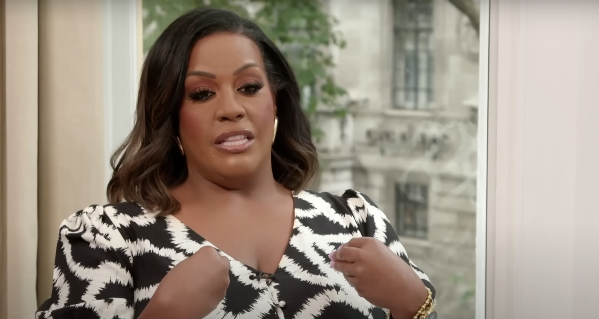 Alison Hammond a black and white patterned dress on This Morning