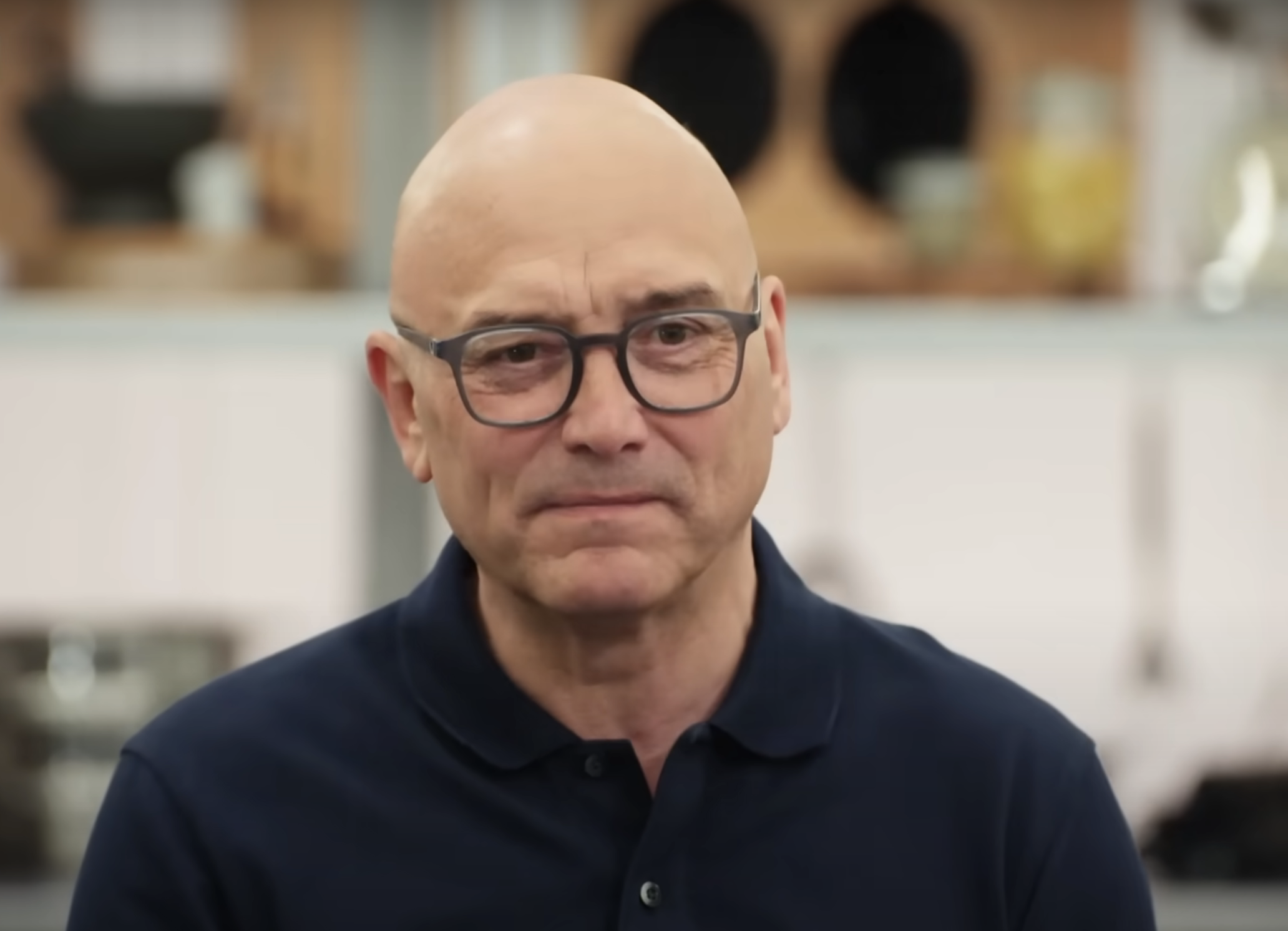 Gregg Wallace in the MasterChef studio in a black polo neck shirt