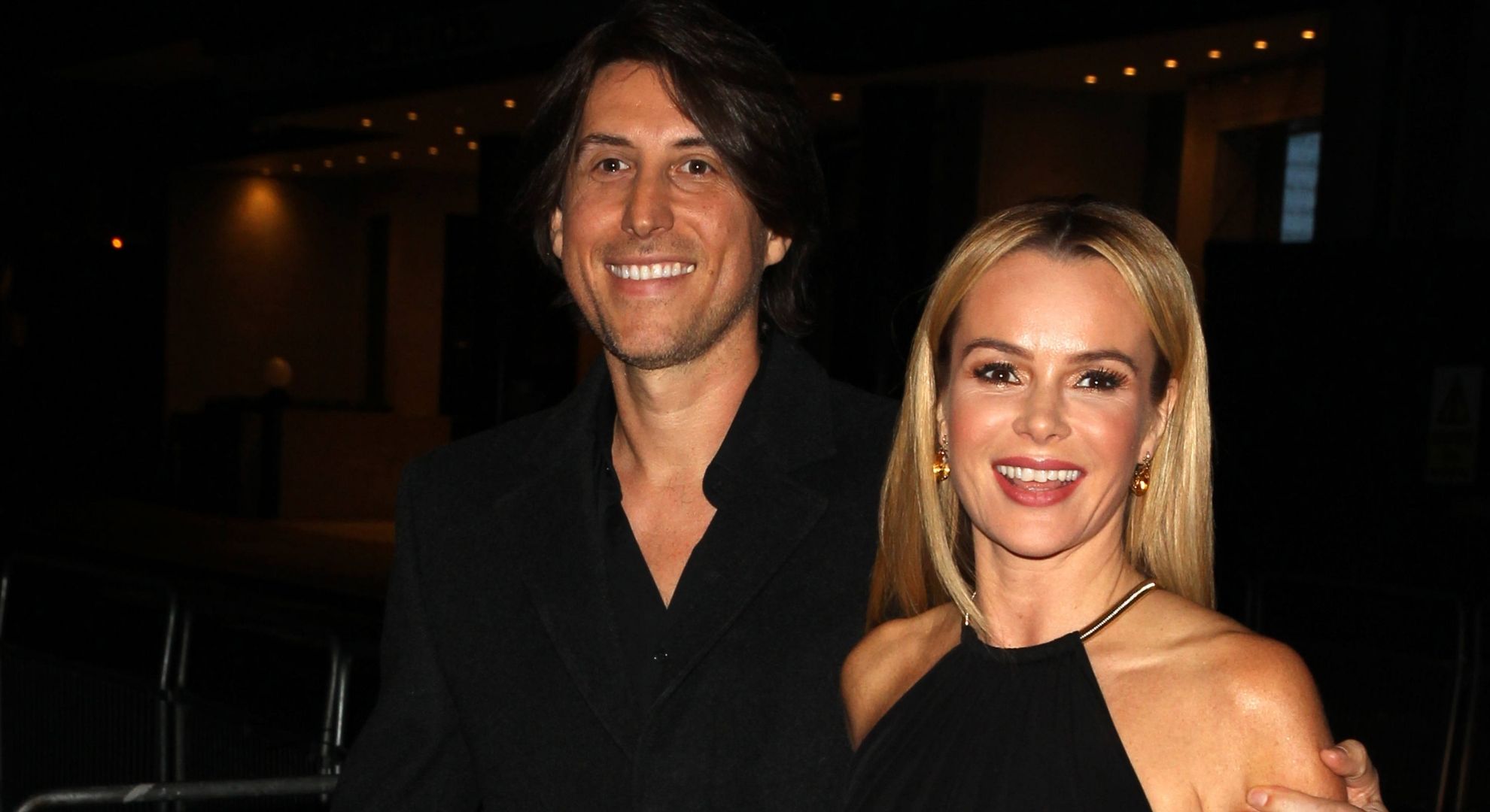 Chris Hughes and Amanda Holden smiling