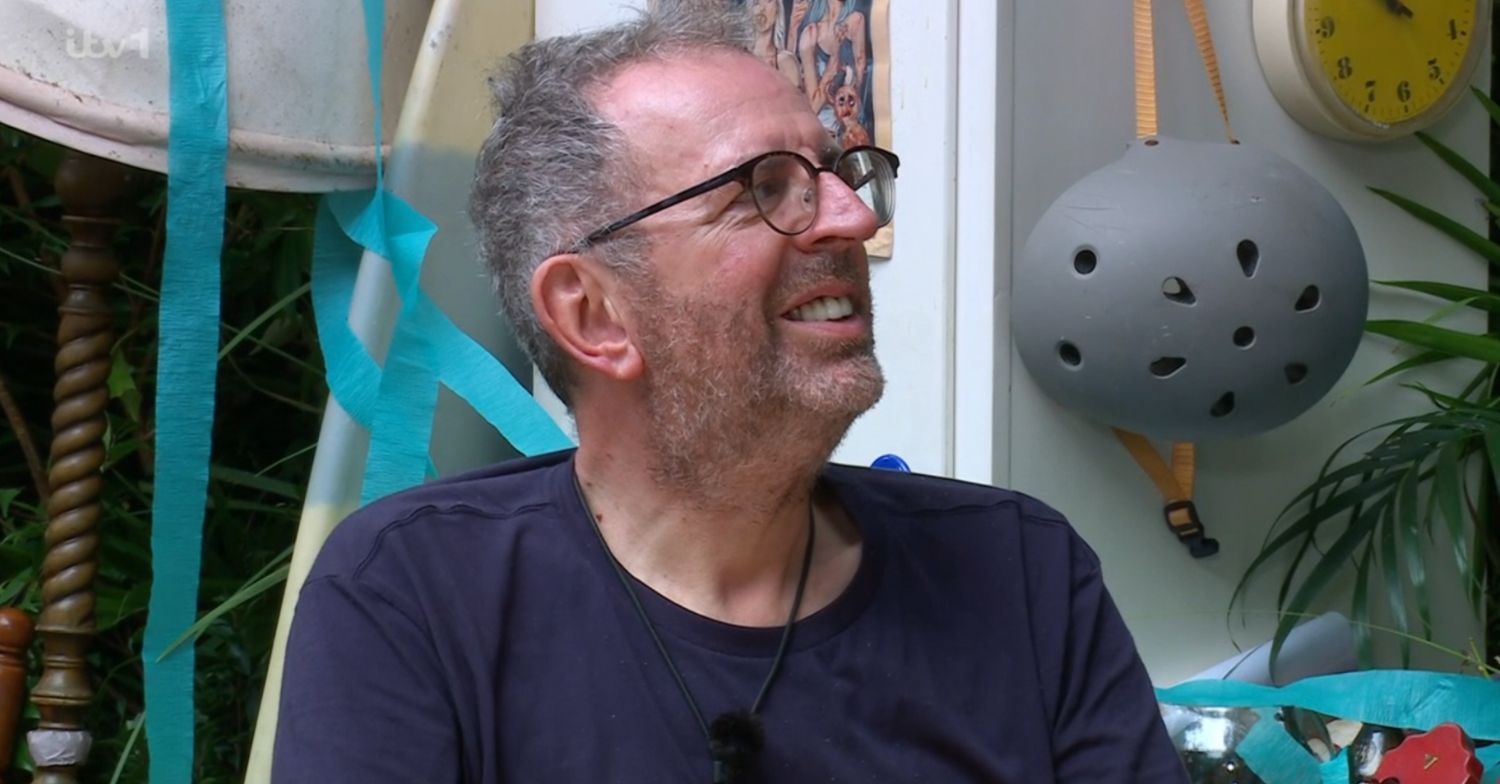 Richard Coles smiling on I'm A Celebrity