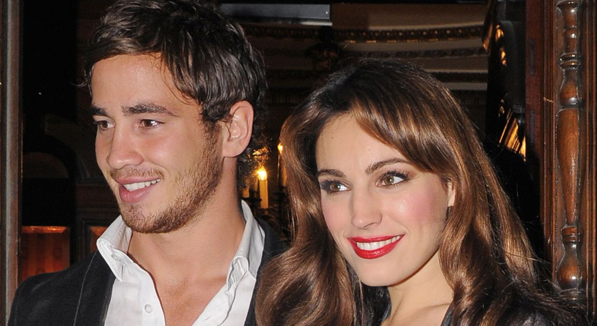 Danny and Kelly Brook posing