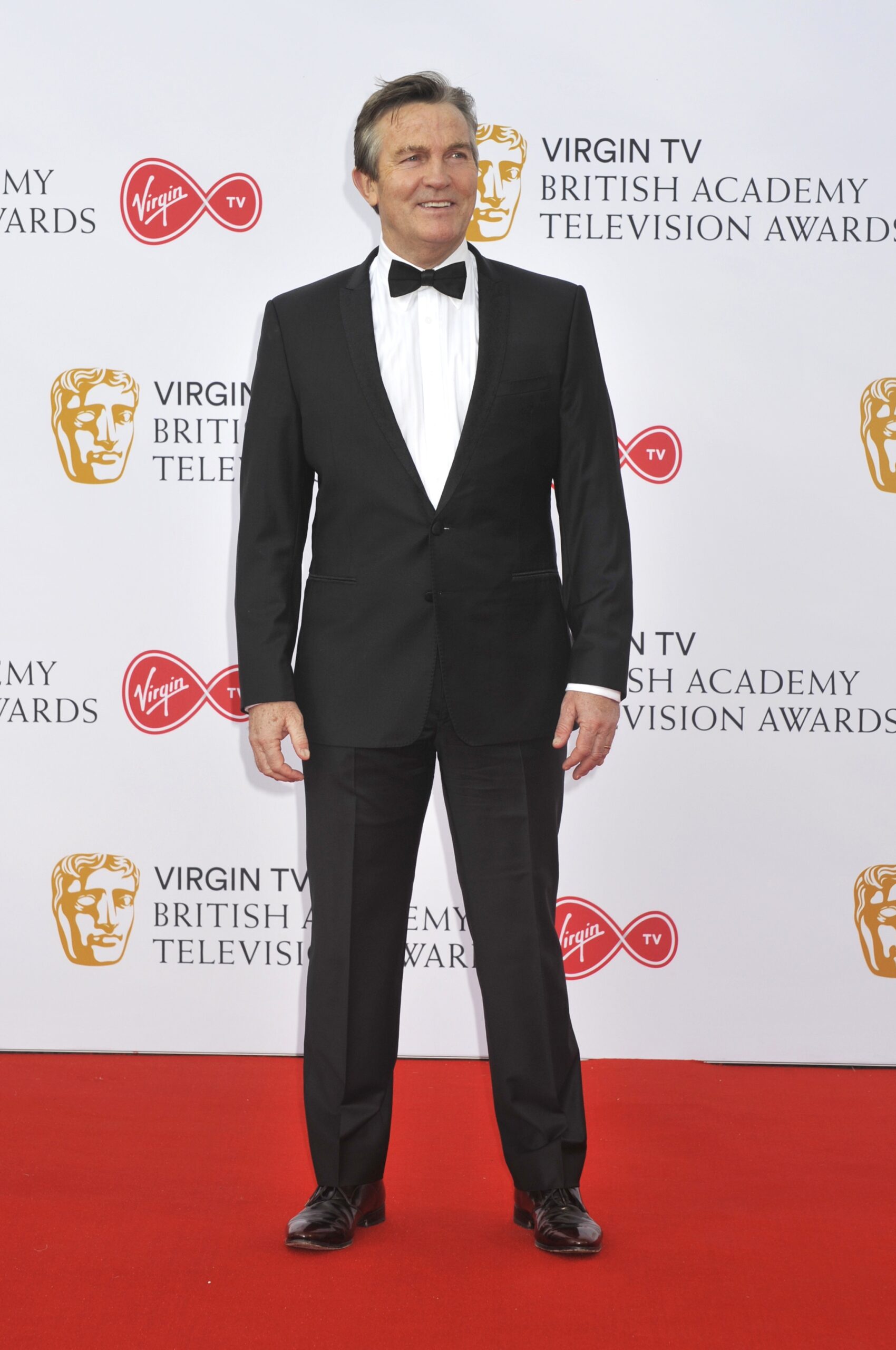 Bradley Walsh dressed in a black suit at The Virgin TV British Academy