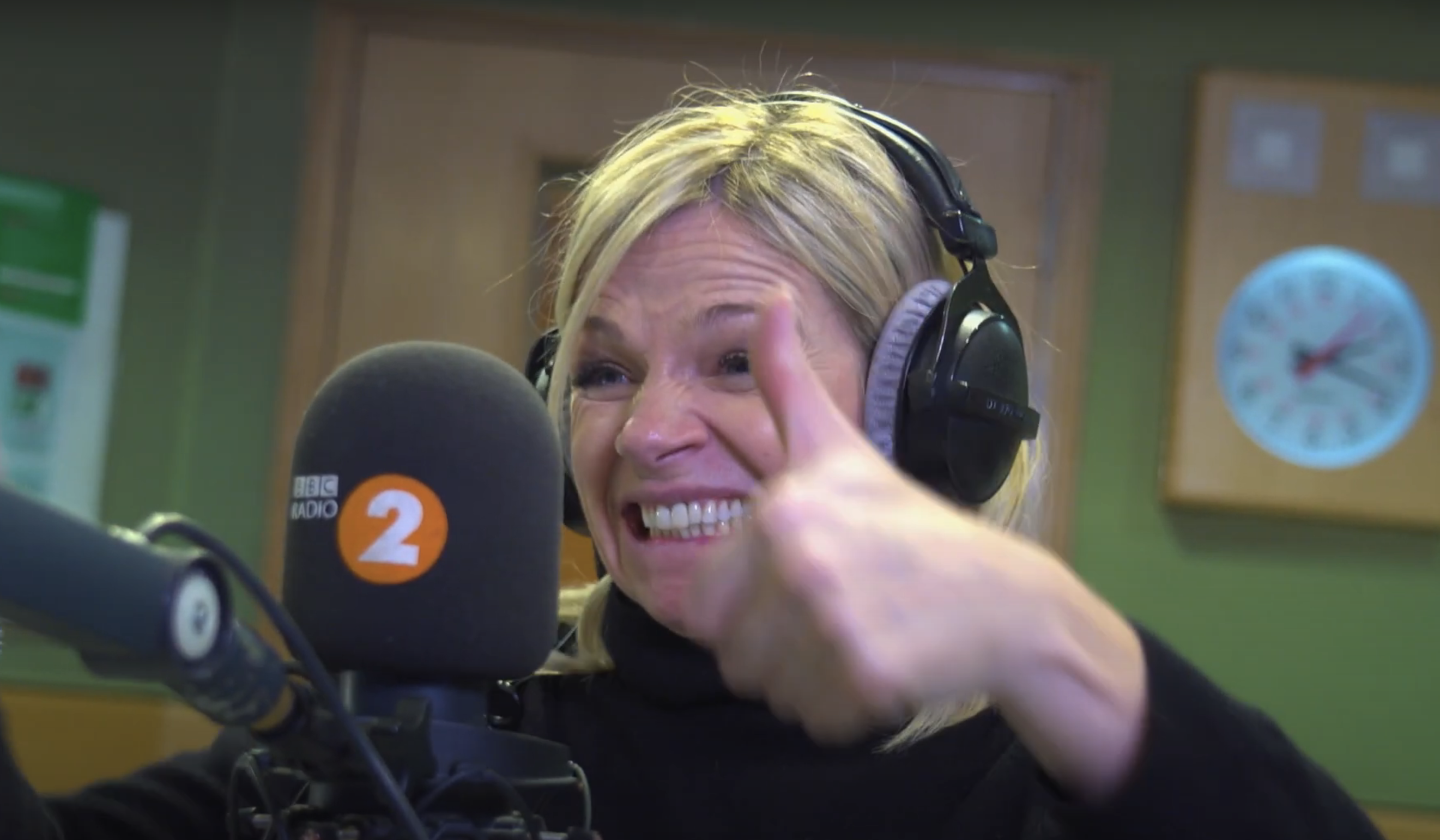 Zoe Ball in a black turtleneck in the BBC Radio 2 studio