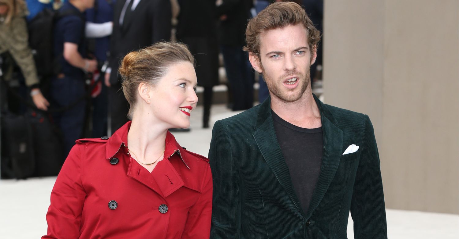 Holliday Grainger looking lovingly at Harry Treadway at a red carpet event