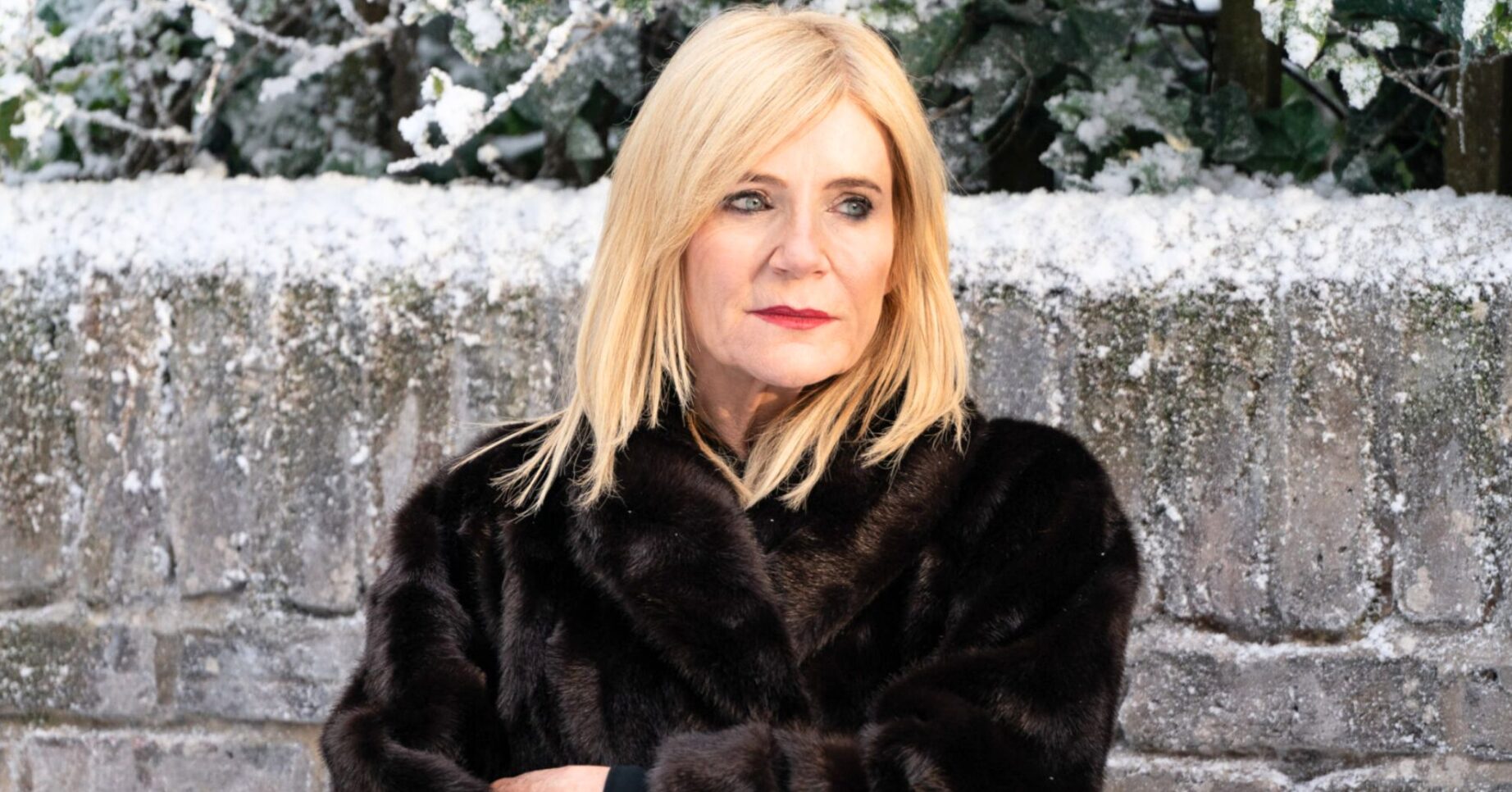 Cindy outside in the cold on EastEnders (Credit: BBC/Composite: ED!)