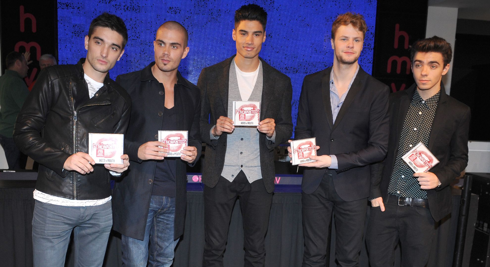 The Wanted holding their CD