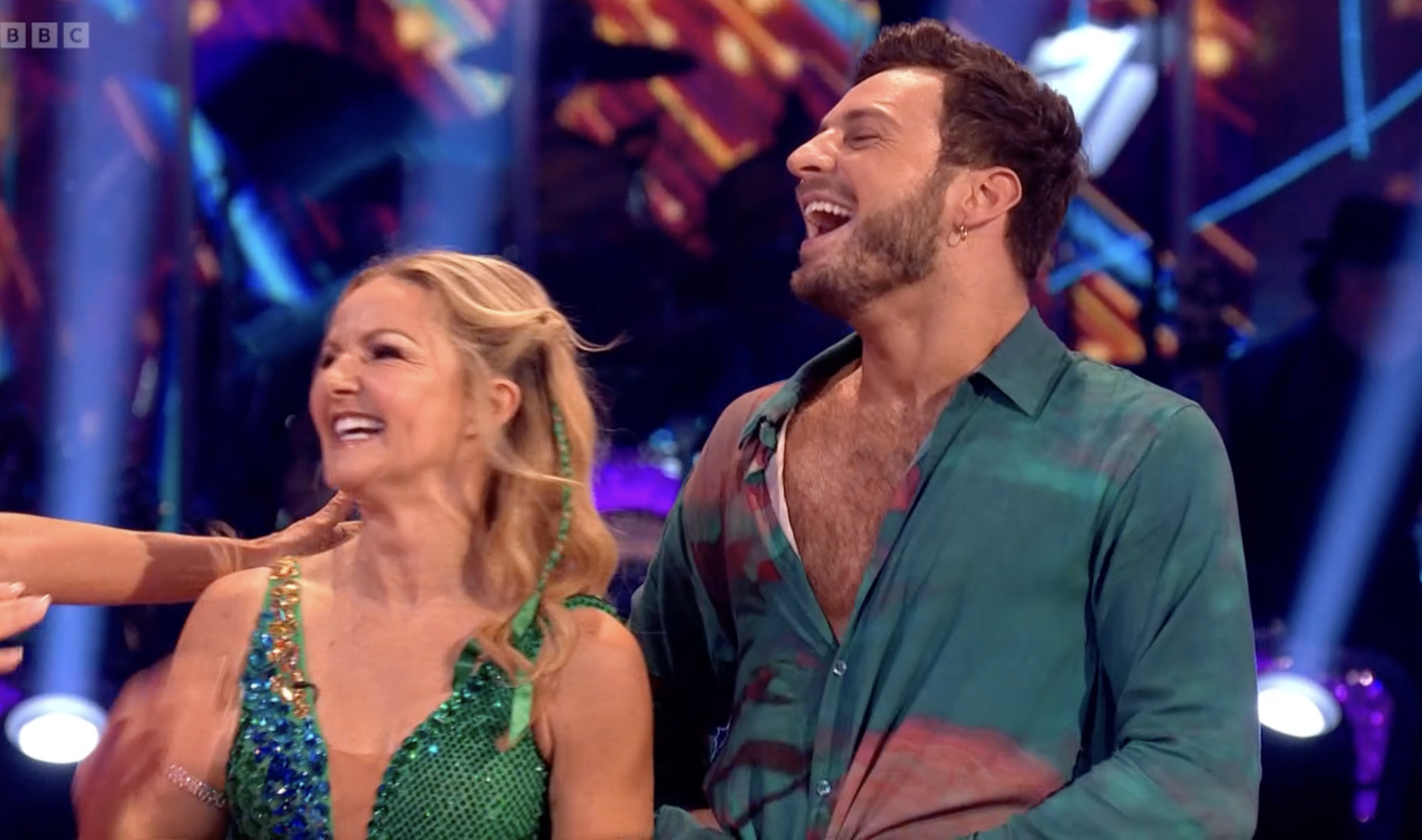 Sarah Hadland laughing as Vito Coppola's trousers break
