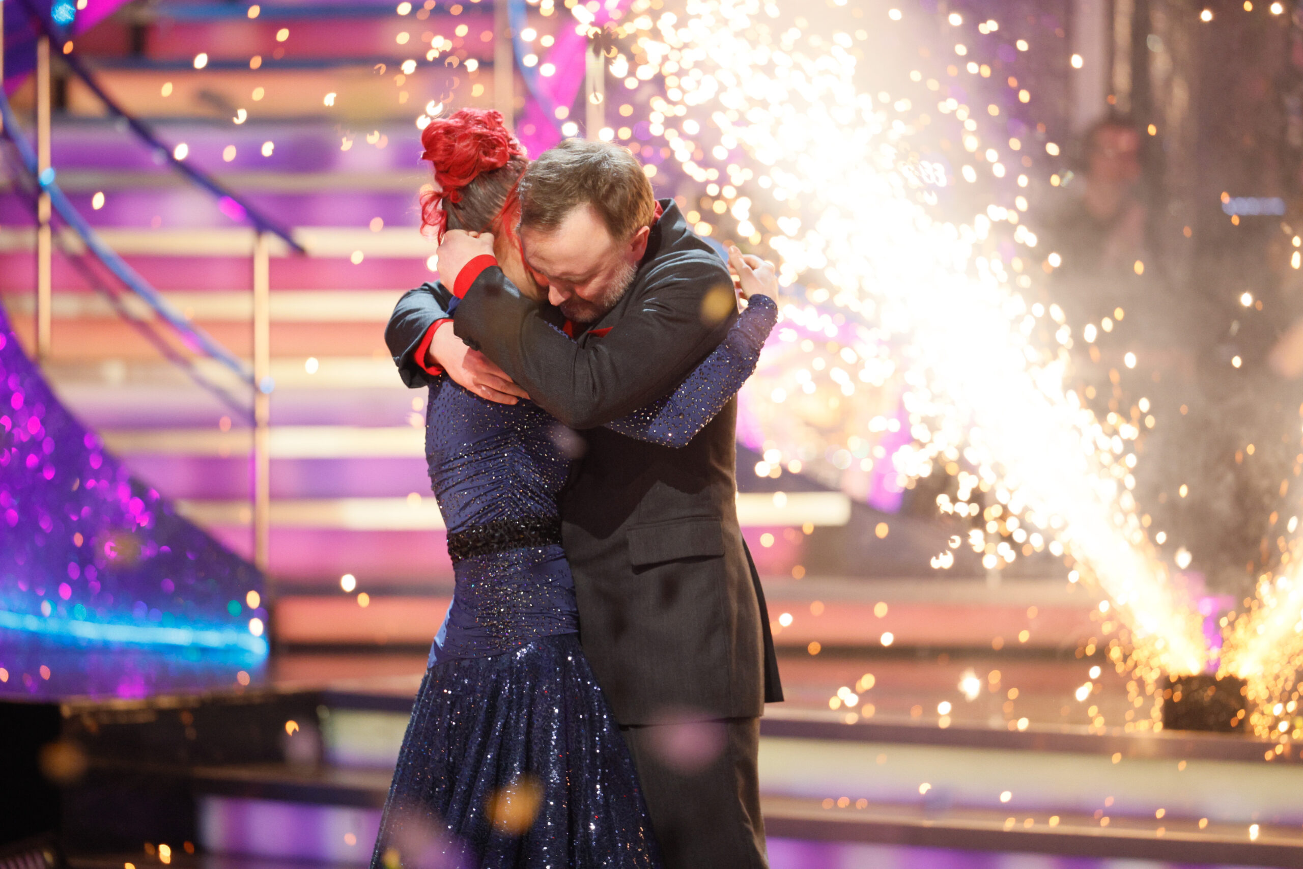 Dianne Buswell and Chris McCausland hugging after winning Strictly 