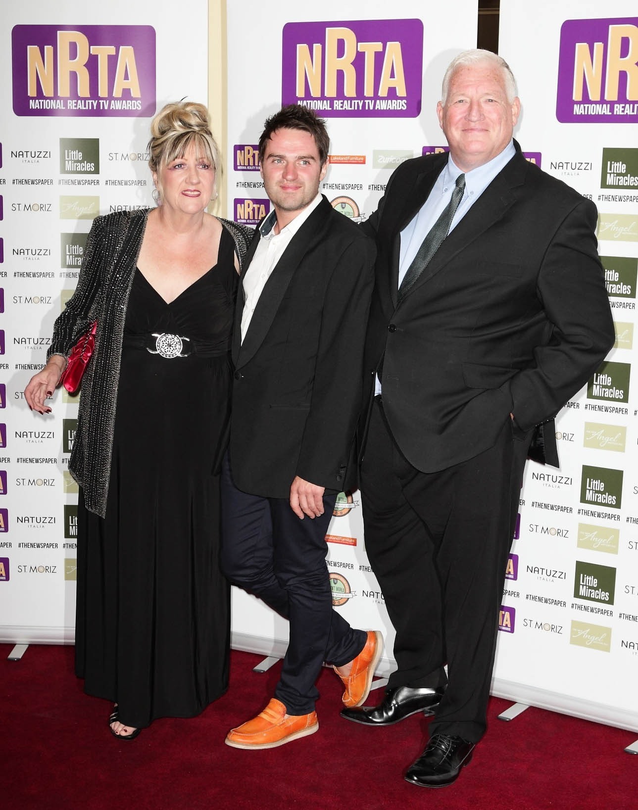 George Gilbey on the red carpet with mother and stepdad Linda and Pete