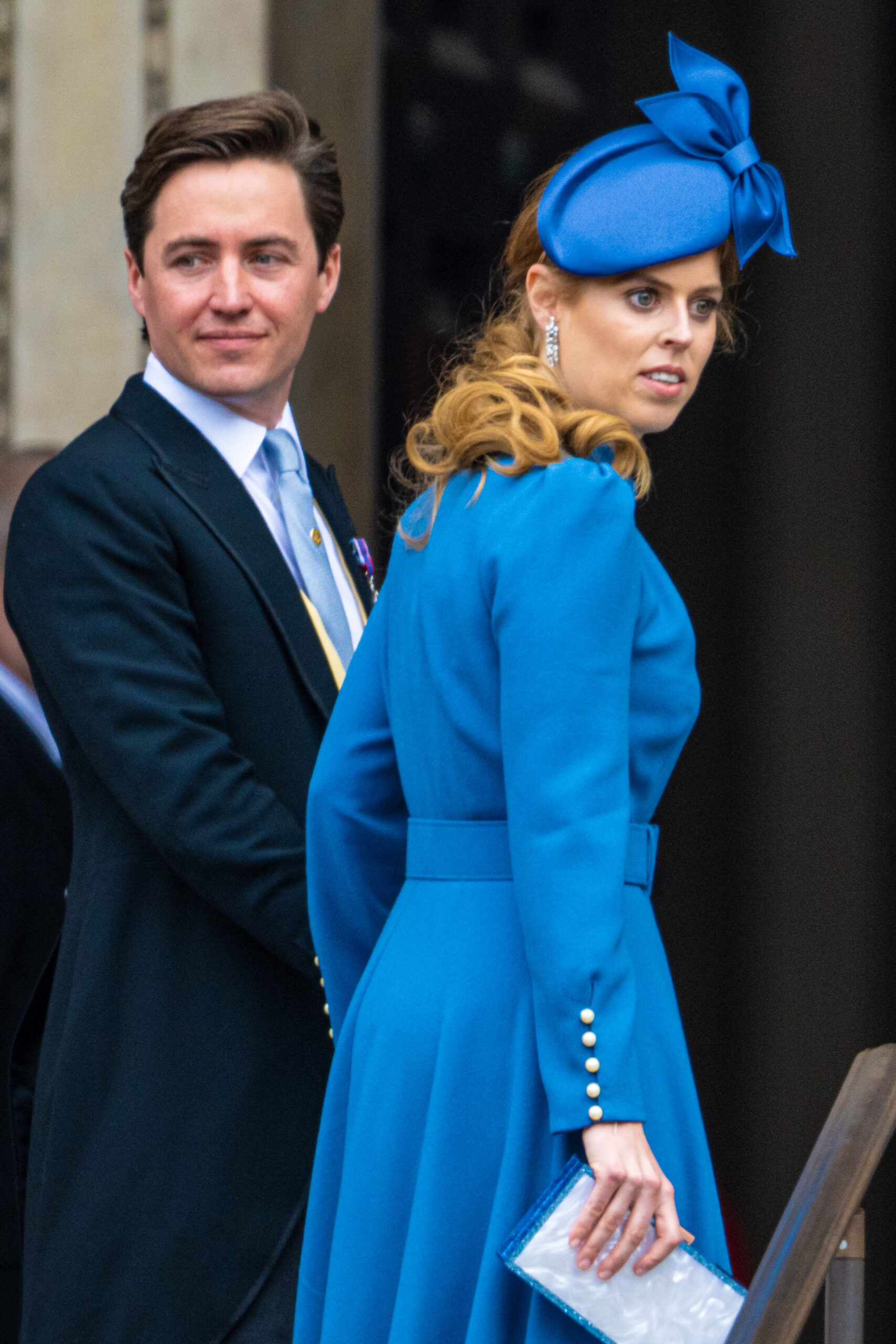 Princess Beatrice and Edoardo Mapelli Mozzi looking over her shoulder